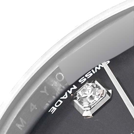 This image shows a close-up of the dial of a Rolex Datejust 279174 Women's Stainless Steel Grey Dial 279174 Women's Stainless Steel Grey Dial watch, highlighting a diamond marker and part of the "SWISS MADE" text.