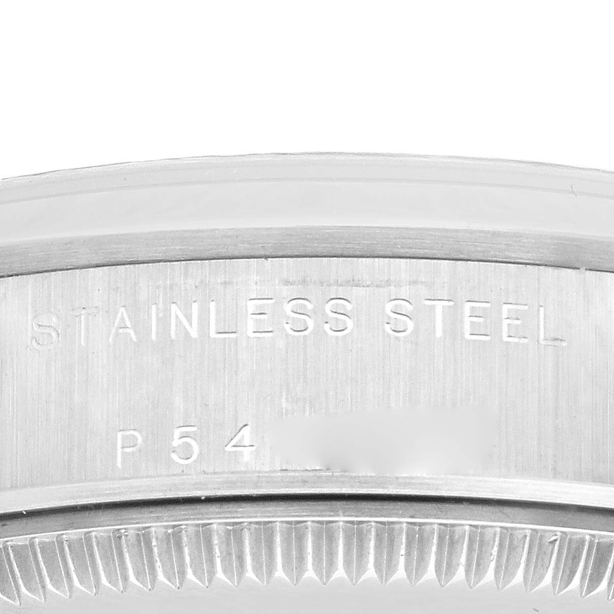 This image shows a close-up of the stainless steel case back of a Rolex Mid-Size 78240 Women
s Stainless Steel Blue Dial 78240 Women
s Stainless Steel Blue Dial model watch.