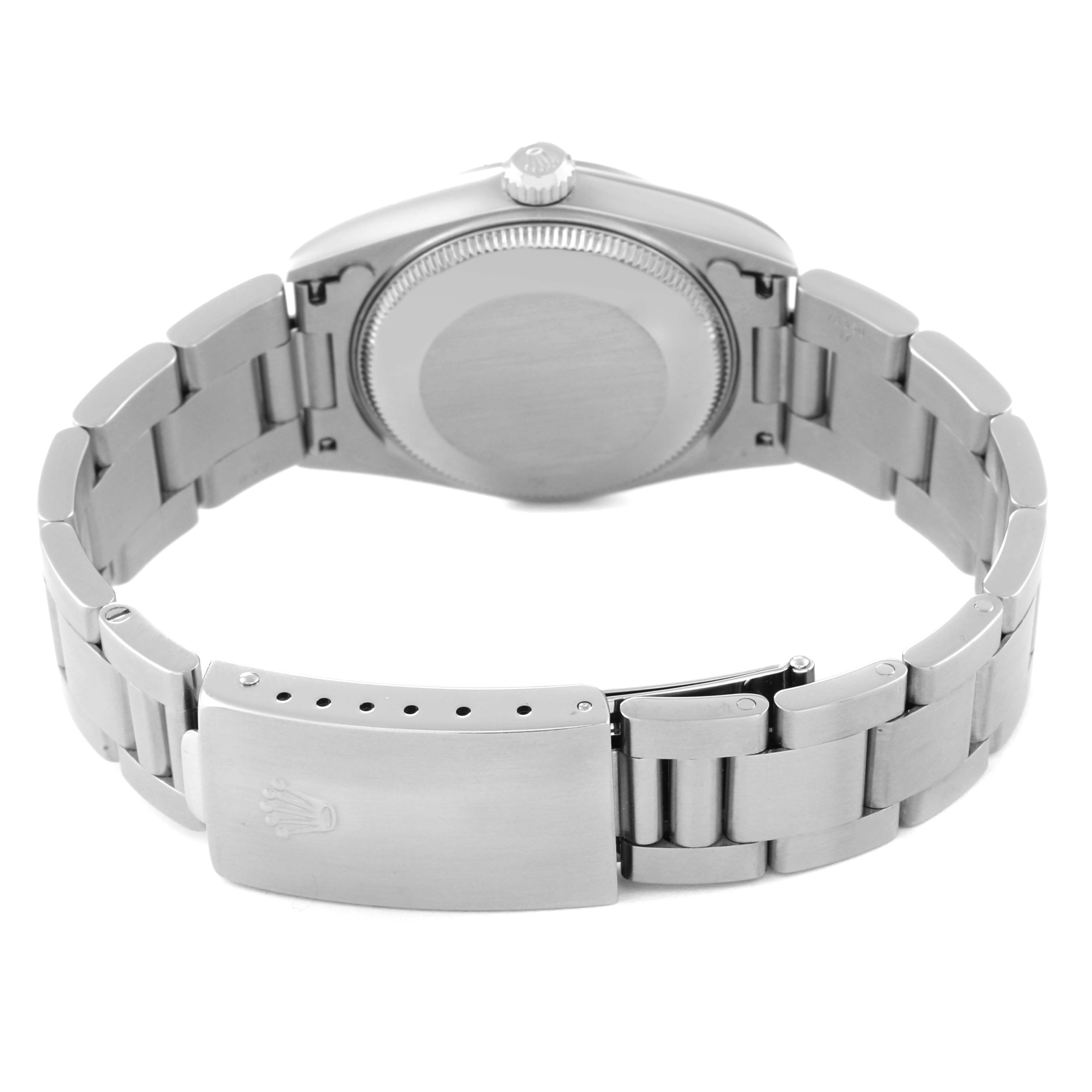 This image shows the back case, crown, and metal bracelet with the clasp of a Mid-Size Rolex watch.