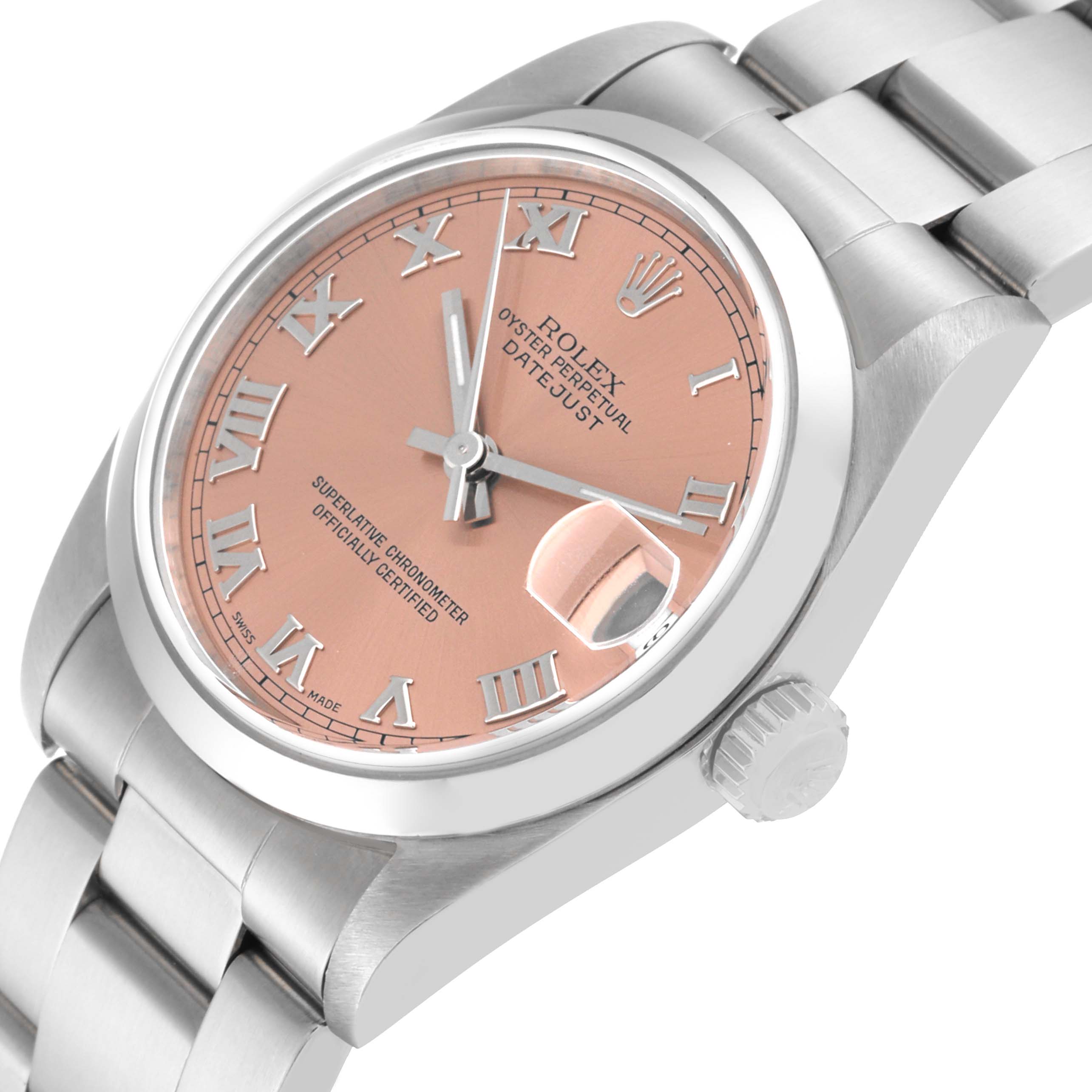 The photo shows a Rolex Mid-Size 78240 Women's Stainless Steel Pink Dial 78240 Women's Stainless Steel Pink Dial Oyster Perpetual Datejust watch at an angled side view, highlighting its dial, crown, and bracelet.