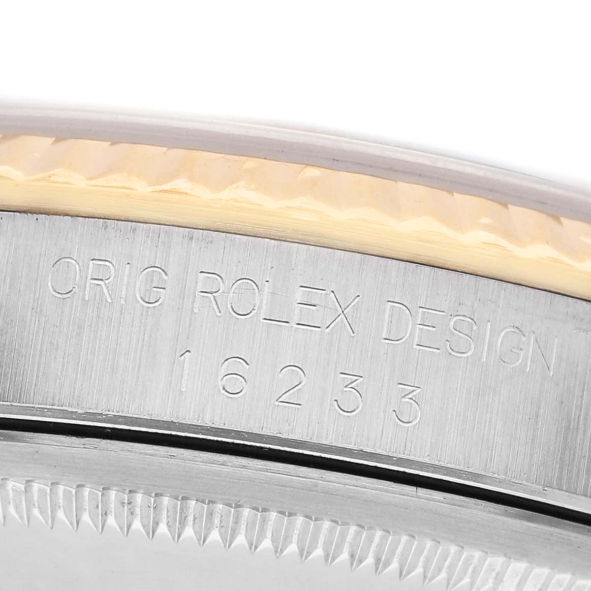 The image shows a close-up angle of the case side of a Rolex Datejust 16233 Men's Steel and Gold (two tone) Silver Dial, highlighting the engraved model number.