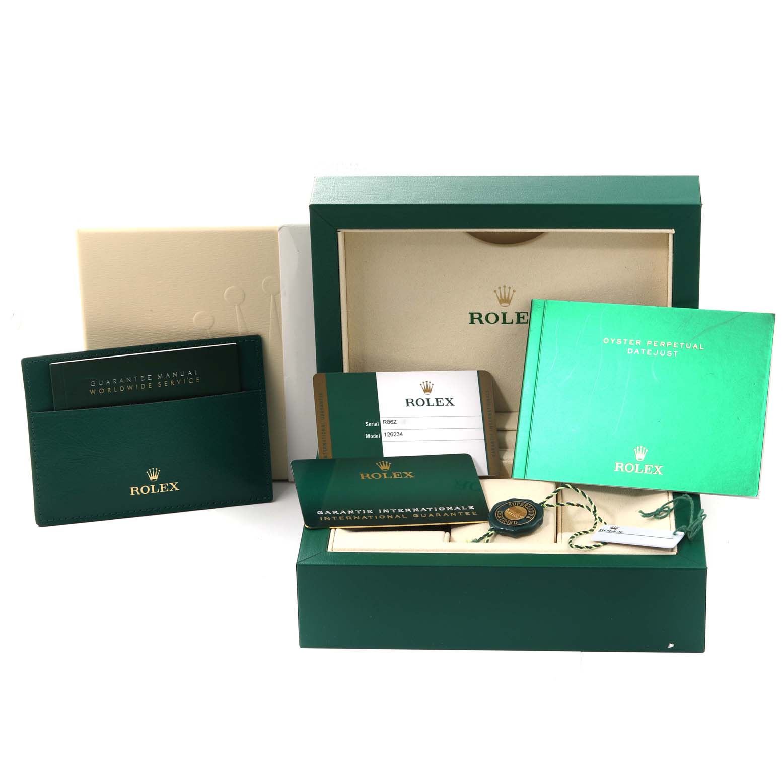 This image shows the packaging, manuals, and warranty cards for a Rolex Datejust 126234 Men's Stainless Steel Black Dial 126234 Men's Stainless Steel Black Dial watch.