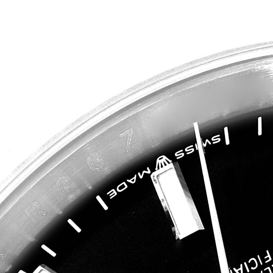 This close-up shows a partial view of the dial and minute markers, including the "Swiss Made" text, of the Rolex Datejust 126234 Men's Stainless Steel Black Dial 126234 Men's Stainless Steel Black Dial watch.