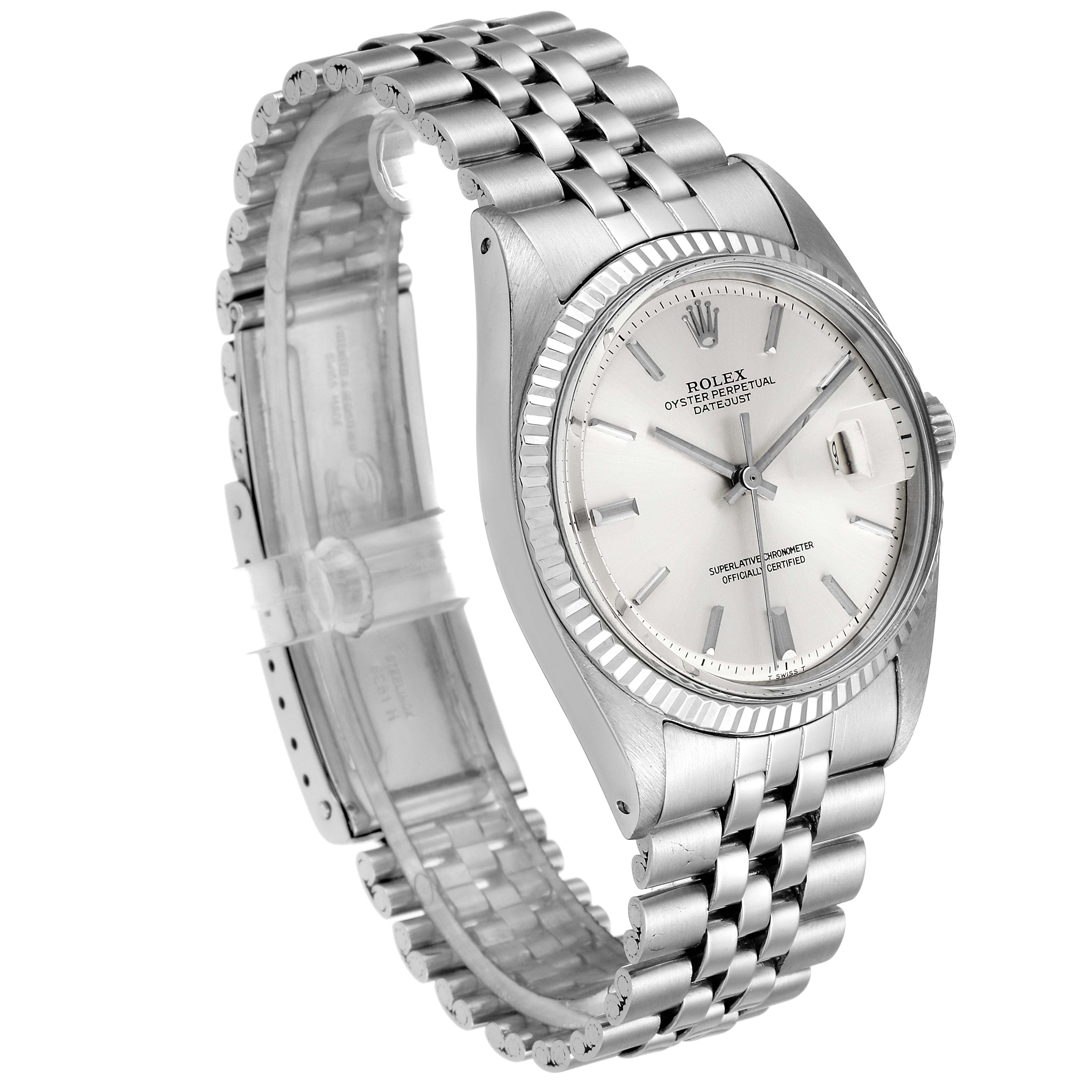 The Vintage Collection Rolex watch is shown from a three-quarter angle, displaying its metallic bracelet, face, and bezel.