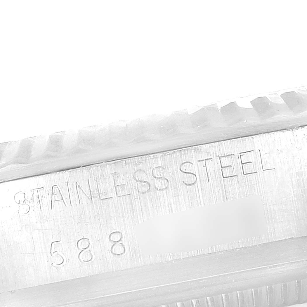 The close-up image shows the stainless steel marking and engraved numbers on the side of a Rolex Vintage Collection 16014 Men
s Stainless Steel Silver Dial 16014 Men
s Stainless Steel Silver Dial watch.