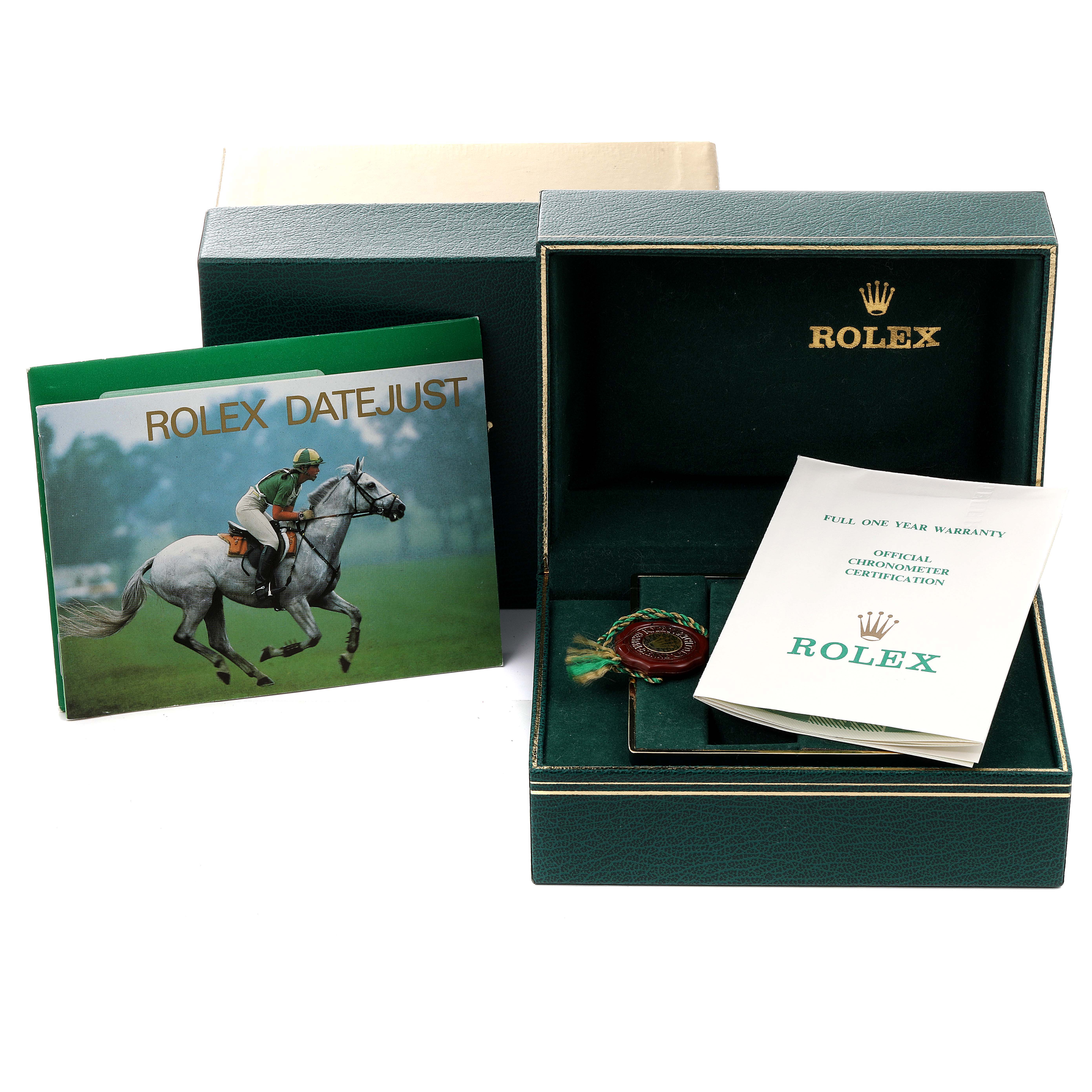 The image shows the packaging, warranty card, and manual for a Rolex Datejust 16233 Men's Steel and Gold (two tone) Black Dial 16233 Men's Steel and Gold (two tone) Black Dial watch.