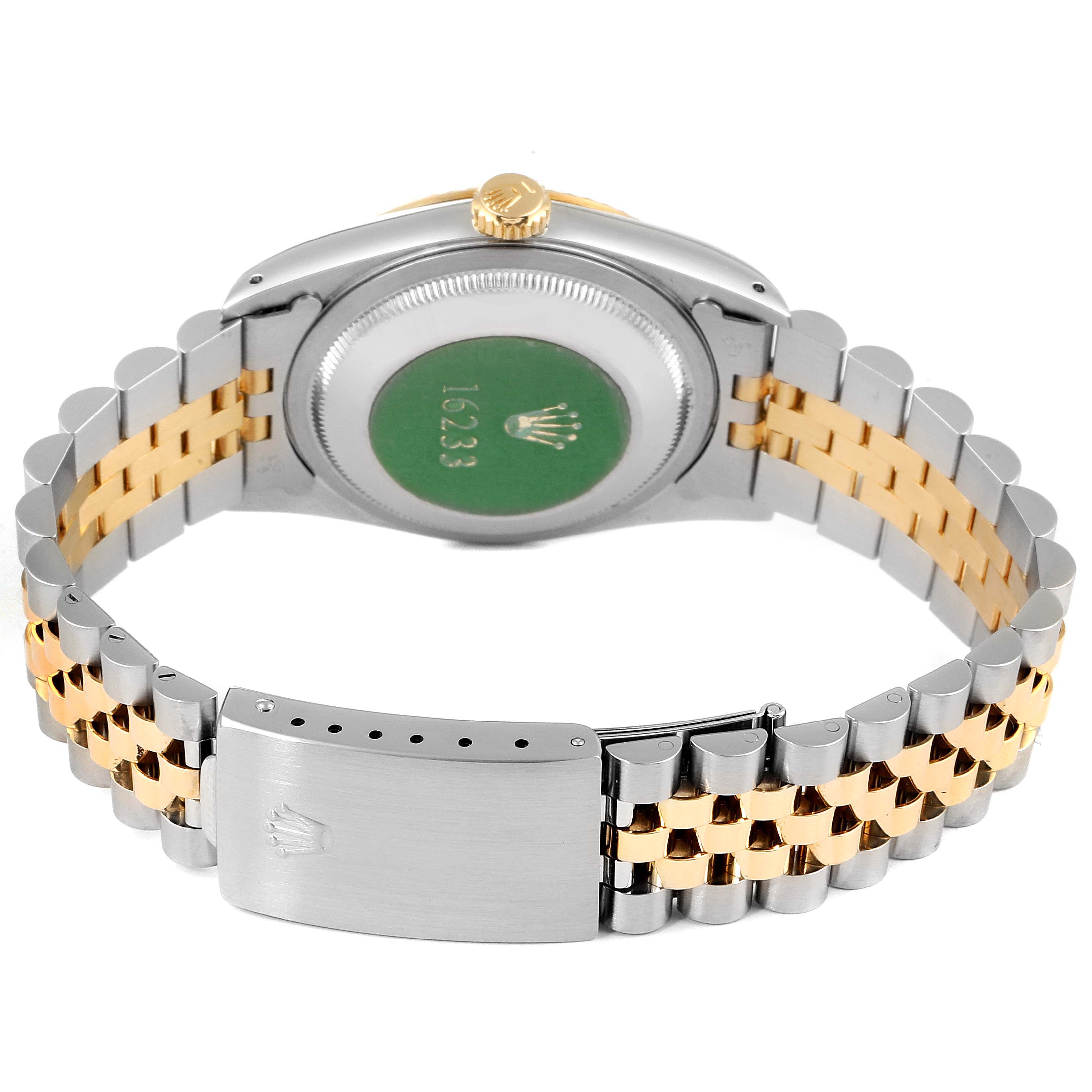 The image shows the back and clasp of a Rolex Datejust 16233 Men's Steel and Gold (two tone) Black Dial 16233 Men's Steel and Gold (two tone) Black Dial watch, featuring a gold and silver bracelet.