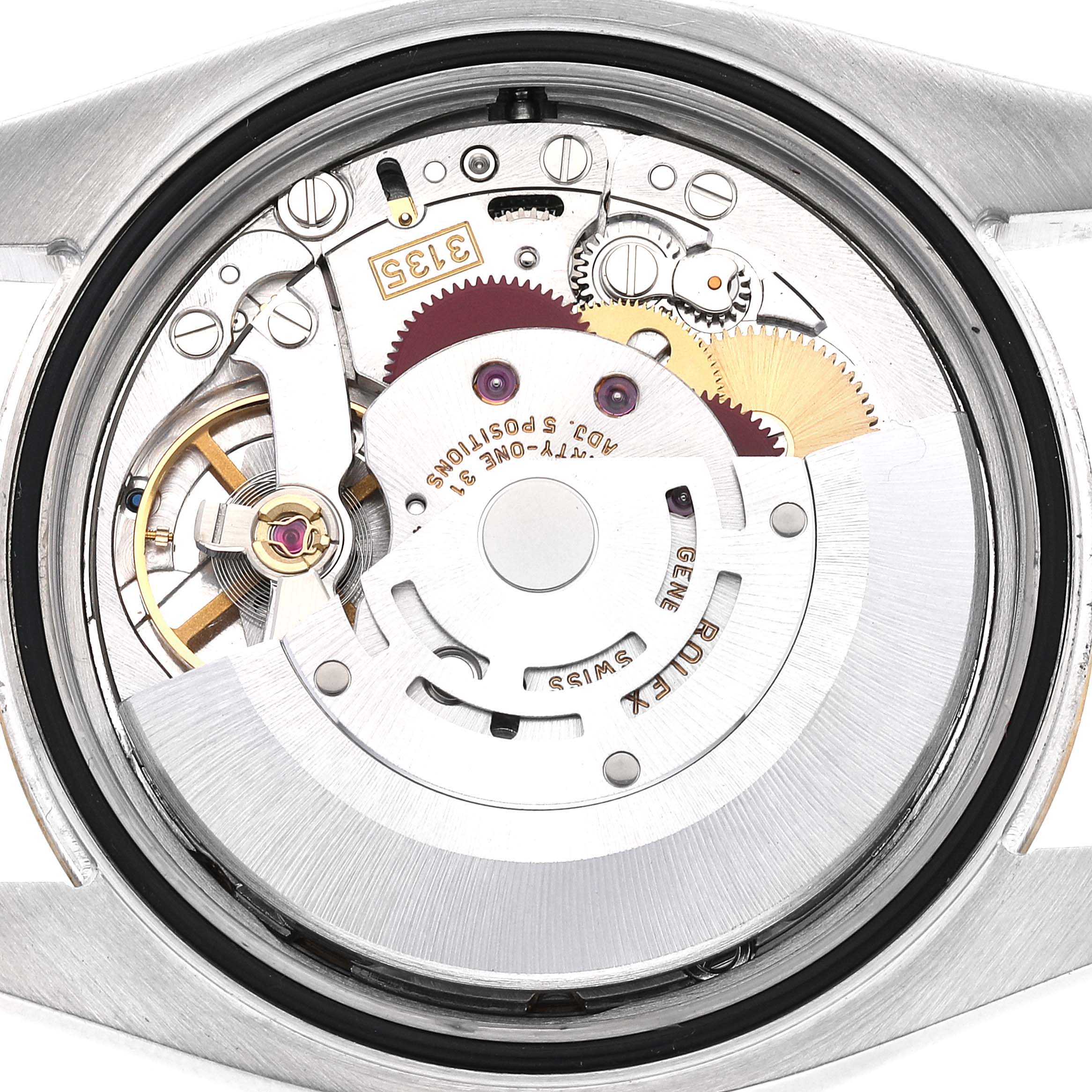 This image shows a close-up of the movement mechanism of a Rolex Datejust 116233 Men's Steel and Gold (two tone) Champagne Dial 116233 Men's Steel and Gold (two tone) Champagne Dial watch from a rear angle with the case back removed.