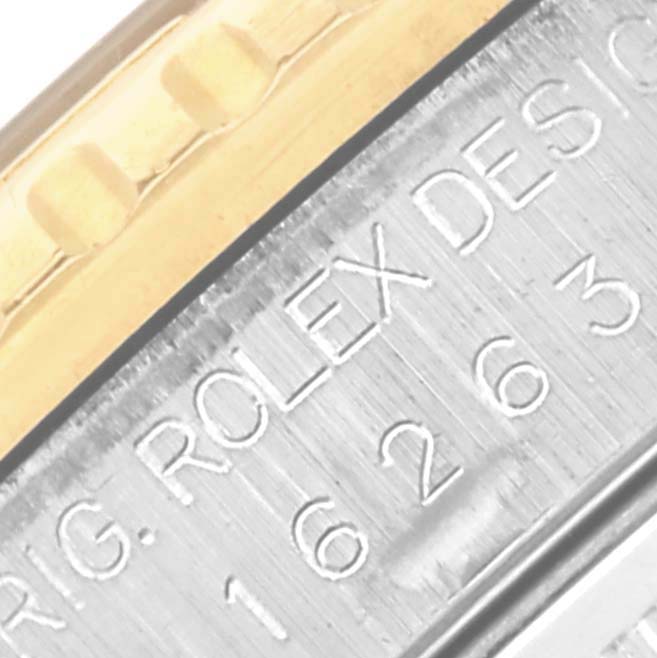 The image shows a close-up of the side engraving and bezel of a Rolex Turn-o-Graph 16263 Men's Steel and Gold (two tone) Black Dial 16263 Men's Steel and Gold (two tone) Black Dial watch.