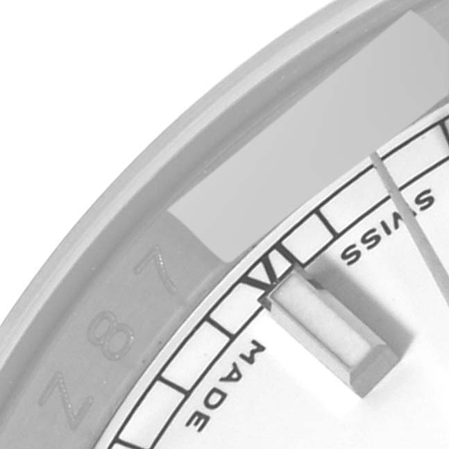 This is a close-up of the dial edge and indices of a Rolex Datejust 116200 Men's Stainless Steel White Dial 116200 Men's Stainless Steel White Dial watch.