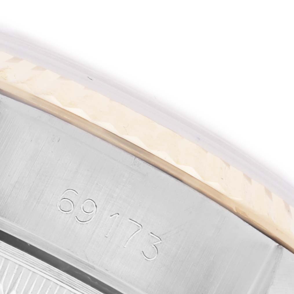 The image shows a close-up of the case side of a Rolex Datejust 69173 Women's Steel and Gold (two tone) White Dial 69173 Women's Steel and Gold (two tone) White Dial, revealing the model number "69173."