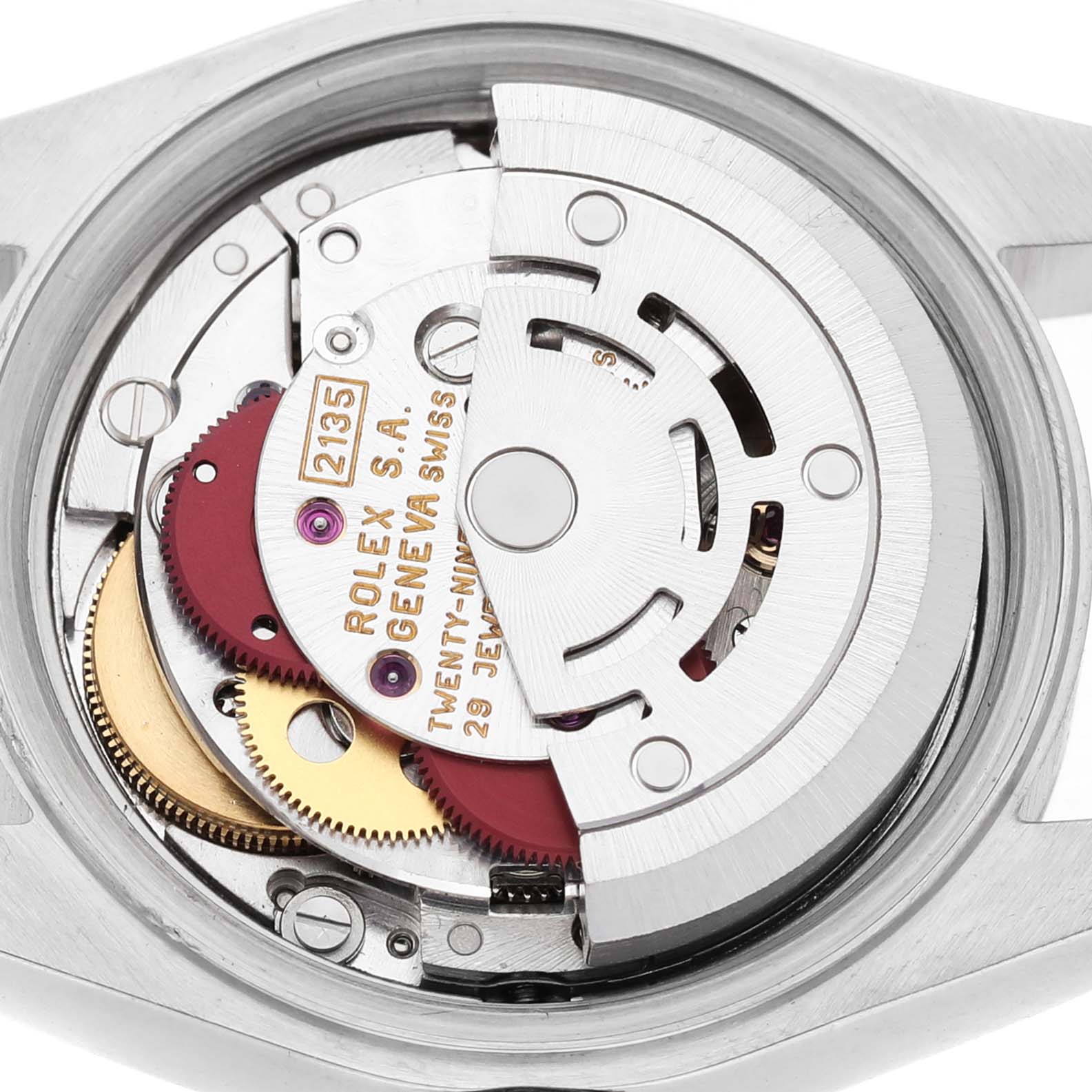 The image shows the inner mechanism of a Rolex Datejust 69173 Women's Steel and Gold (two tone) White Dial watch, including gears and the rotor, viewed from the back.