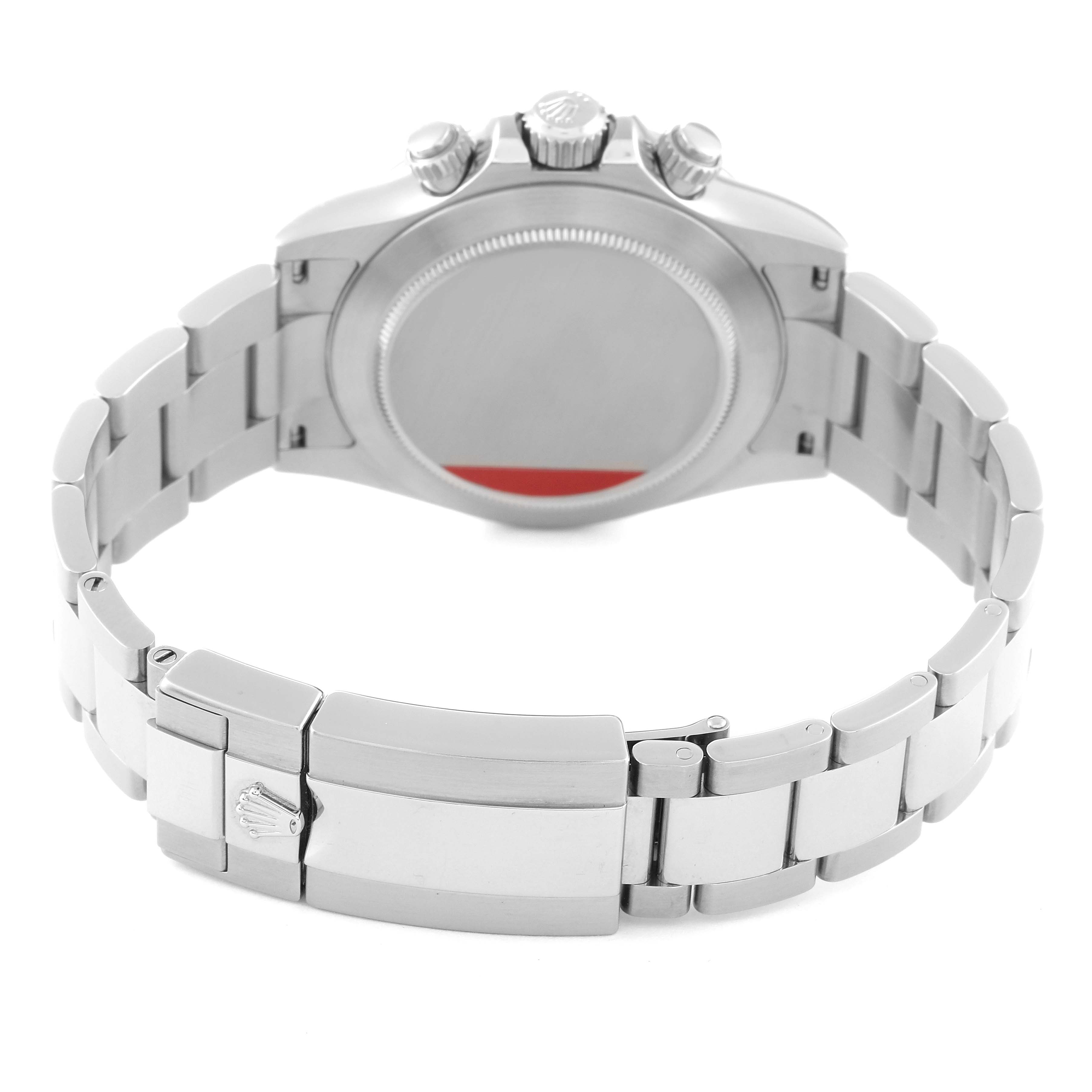 This image shows the back case and clasp of a Rolex Daytona 116520 Men's Stainless Steel Black Dial 116520 Men's Stainless Steel Black Dial watch, with a view of the bracelet and crown.