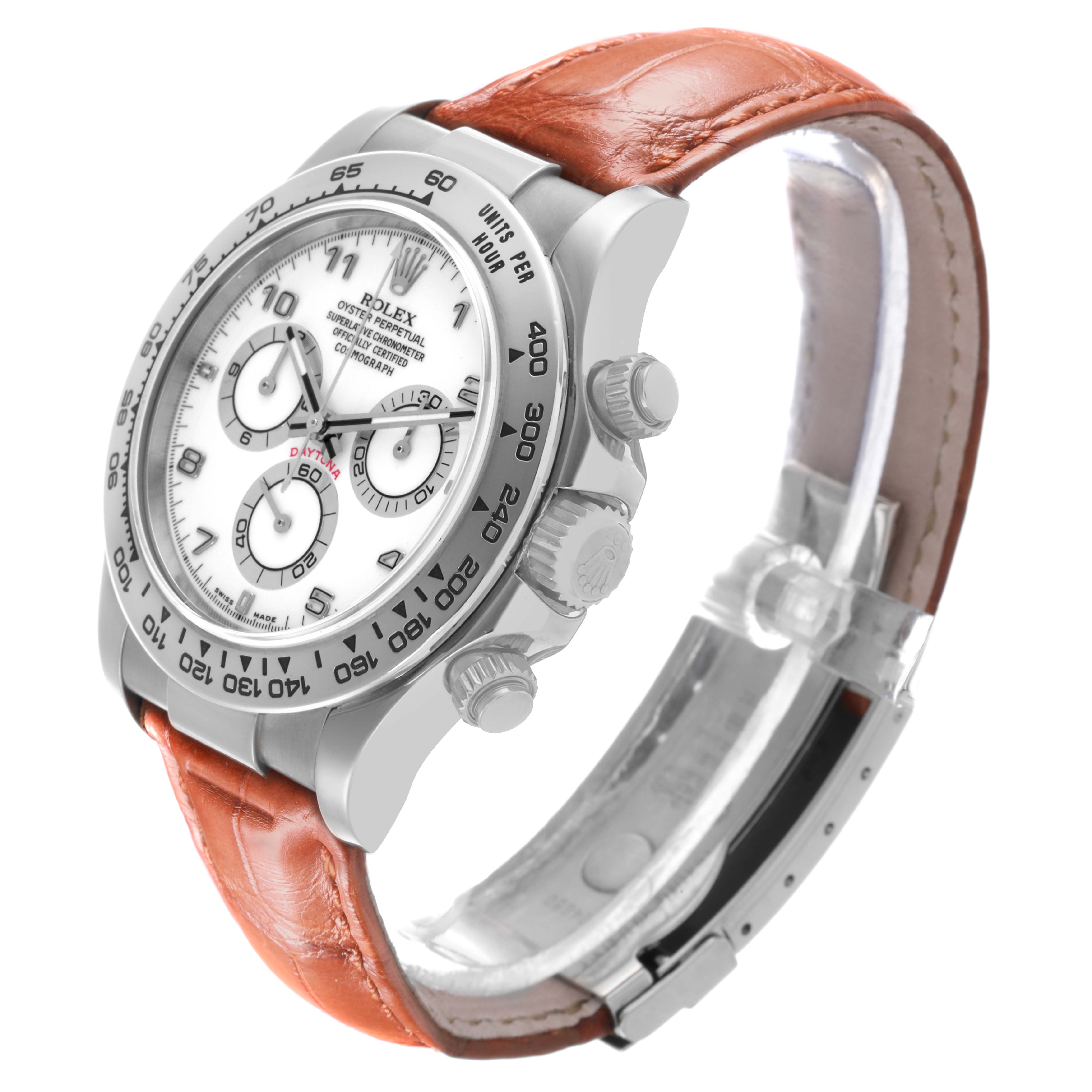 The Rolex Daytona 116519 Men's White Gold White Dial 116519 Men's White Gold White Dial watch is shown in a three-quarter angle, highlighting the face, bezel, pushers, and leather strap.