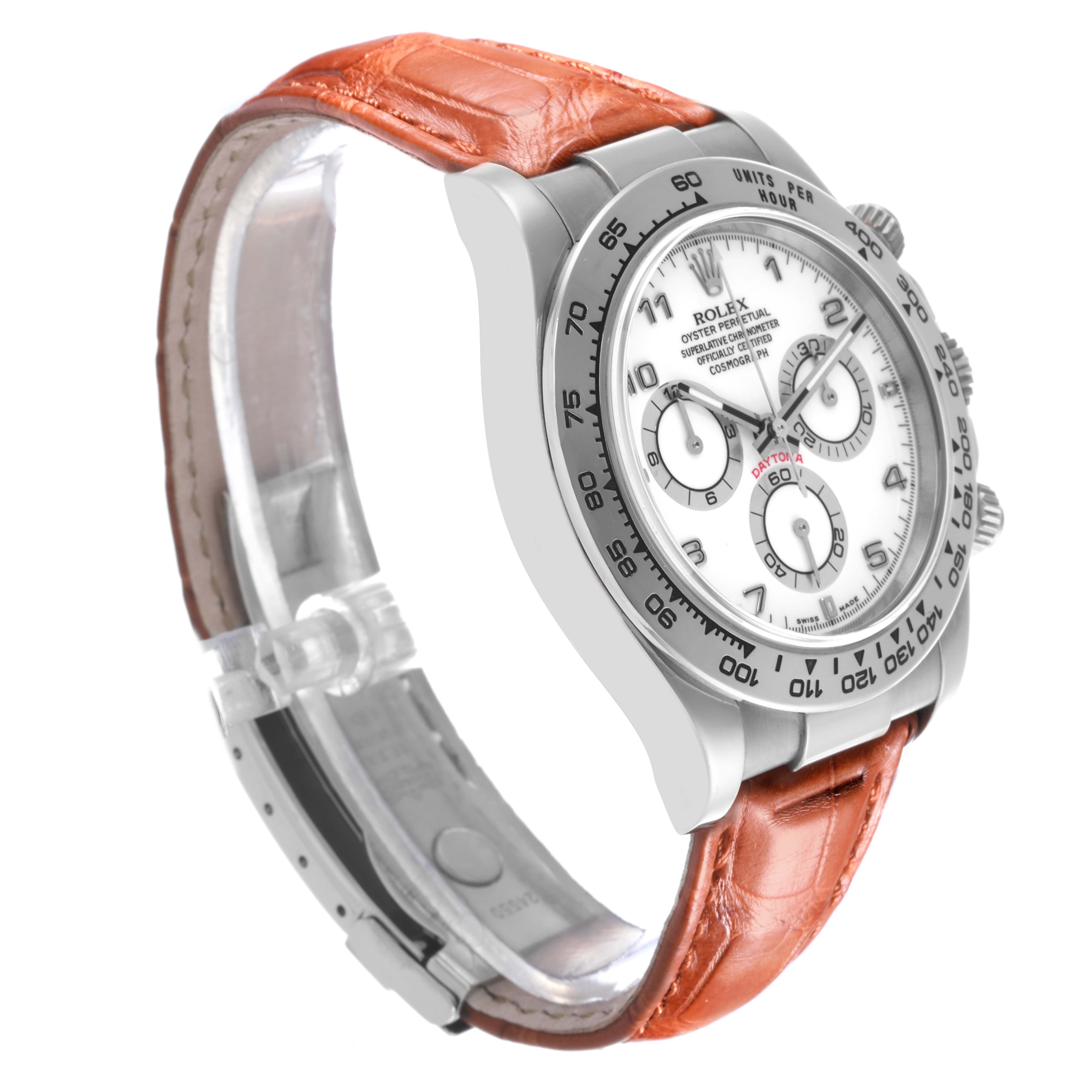 The Rolex Daytona 116519 Men's White Gold White Dial 116519 Men's White Gold White Dial watch is shown at a three-quarter angle, displaying its dial, bezel, side buttons, and leather strap.