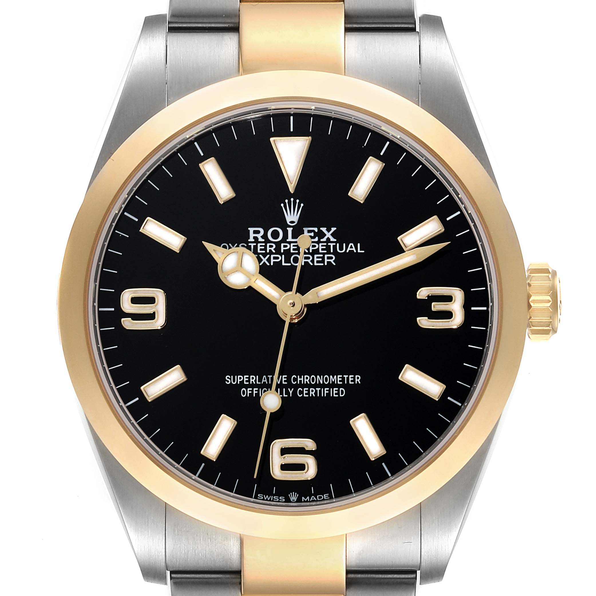 The image shows a front view of the Rolex Explorer 124273 Men
s Steel and Gold (two tone) Black Dial 124273 Men
s Steel and Gold (two tone) Black Dial watch, highlighting the black dial, gold bezel, and two-tone bracelet.