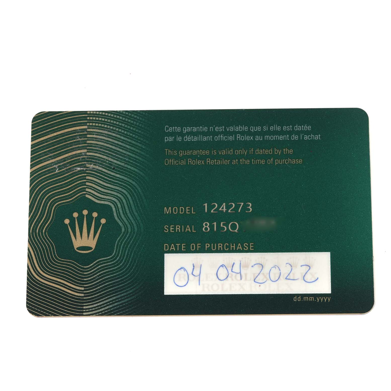 This image shows a guarantee card for the Rolex Explorer 124273 Men
s Steel and Gold (two tone) Black Dial 124273 Men
s Steel and Gold (two tone) Black Dial model 124273 with purchase date 04.04.2022.