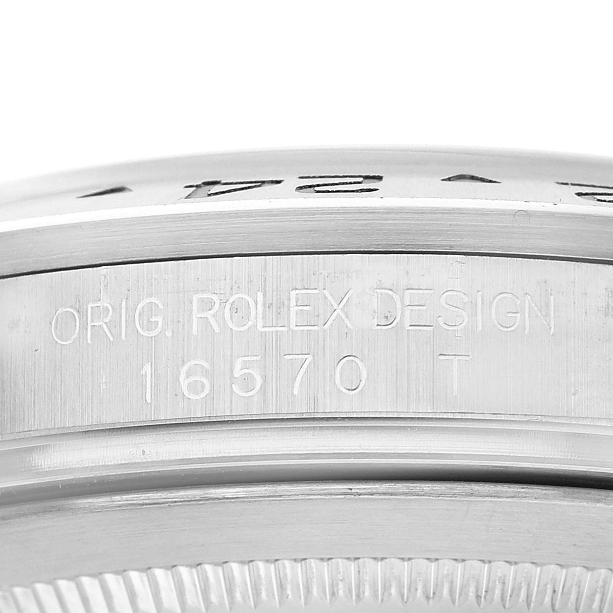 The image shows a close-up of the case side of a Rolex Explorer 16570 Men's Stainless Steel White Dial, highlighting the engraved model number "16570 T."