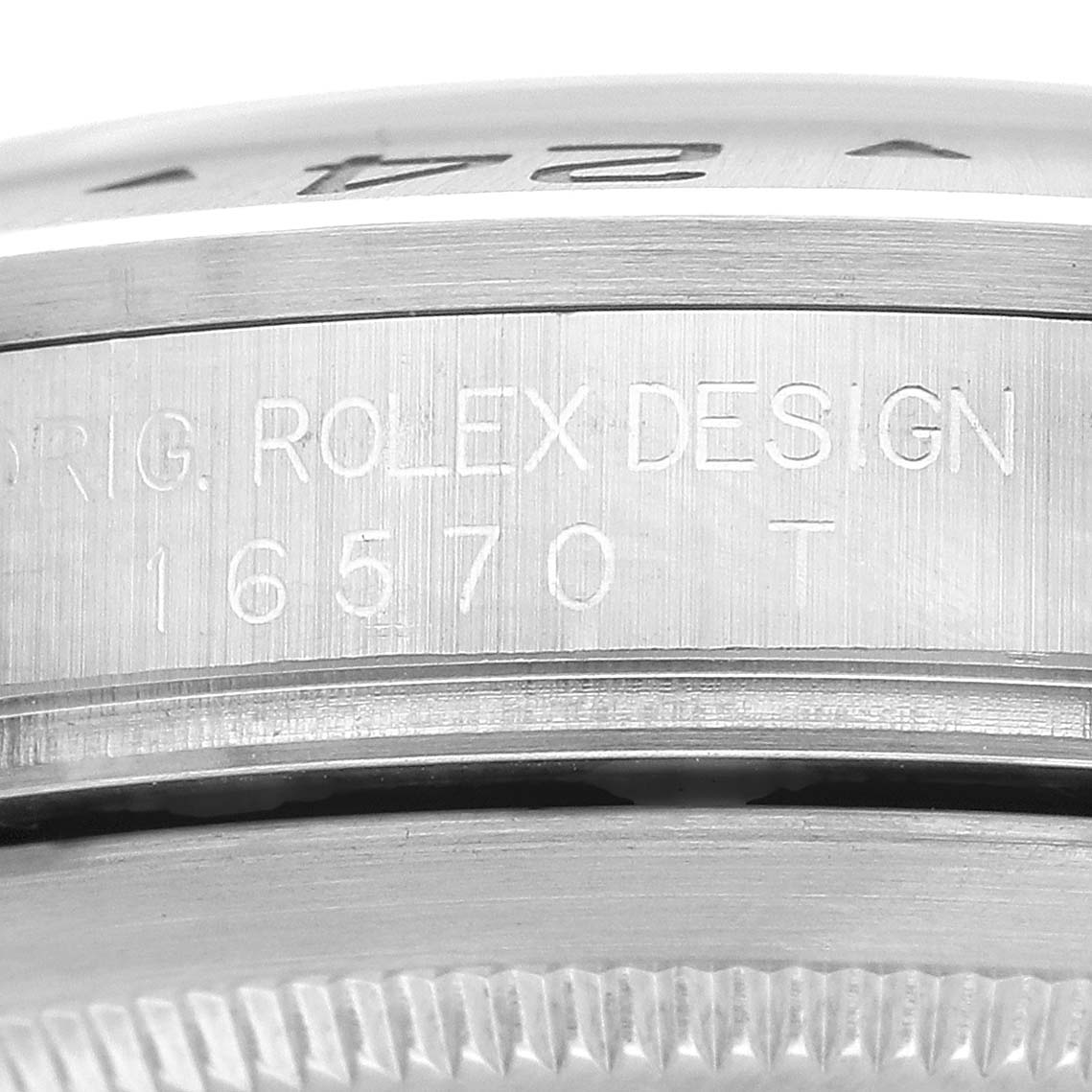 The image shows a close-up of the side engraving on a Rolex Explorer 16570 Men's Stainless Steel Black Dial model, highlighting the model number.
