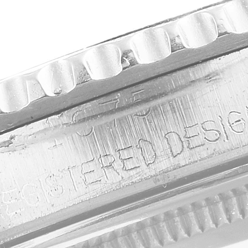 The image shows a close-up of the bezel and case side of a Rolex GMT-Master 1675 Men's Stainless Steel Black Dial 1675 Men's Stainless Steel Black Dial watch, highlighting the text "REGISTERED DESIGN."