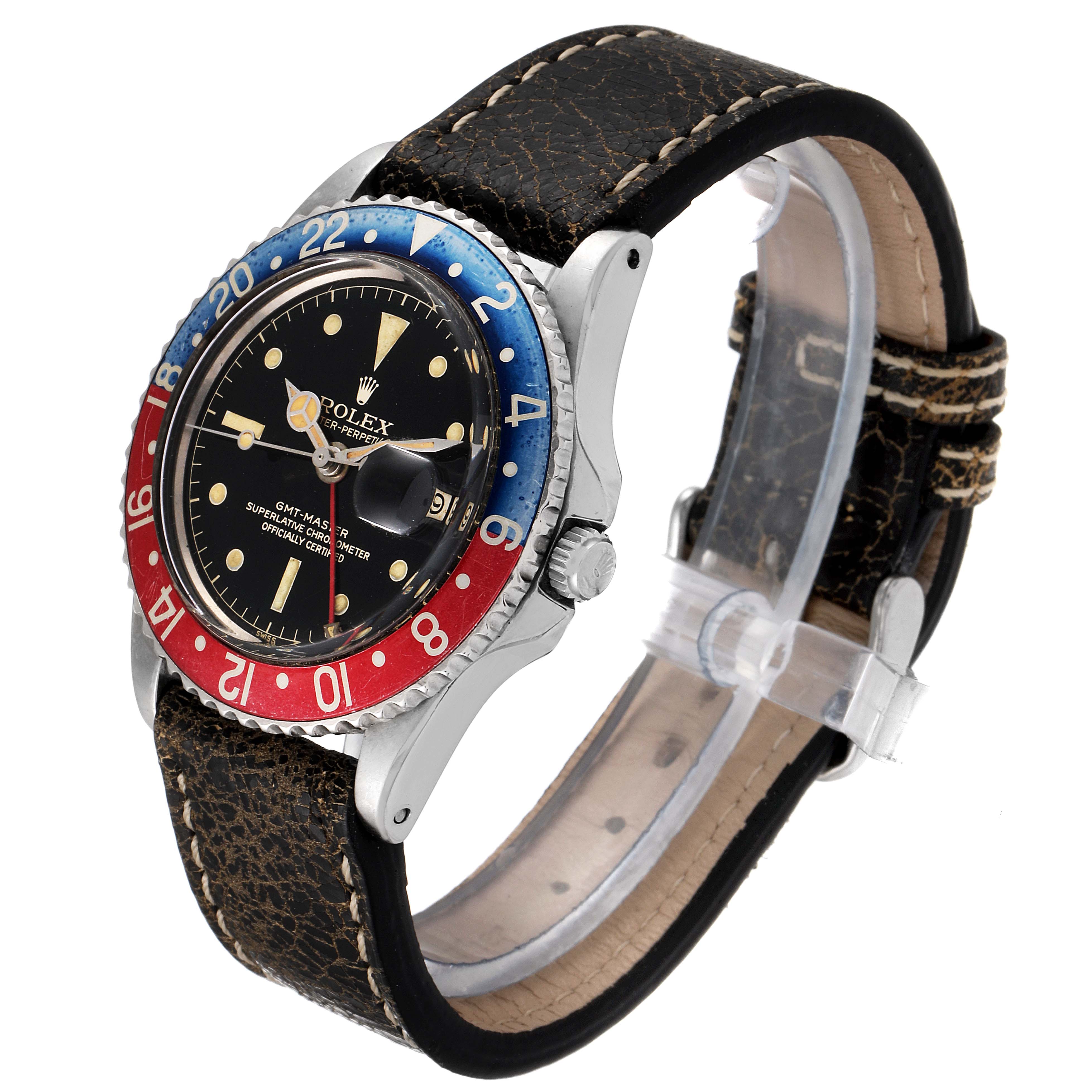 The image shows a Rolex GMT-Master 1675 Men's Stainless Steel Black Dial 1675 Men's Stainless Steel Black Dial watch at an angled side view, displaying the dial, bezel, crown, and leather strap.