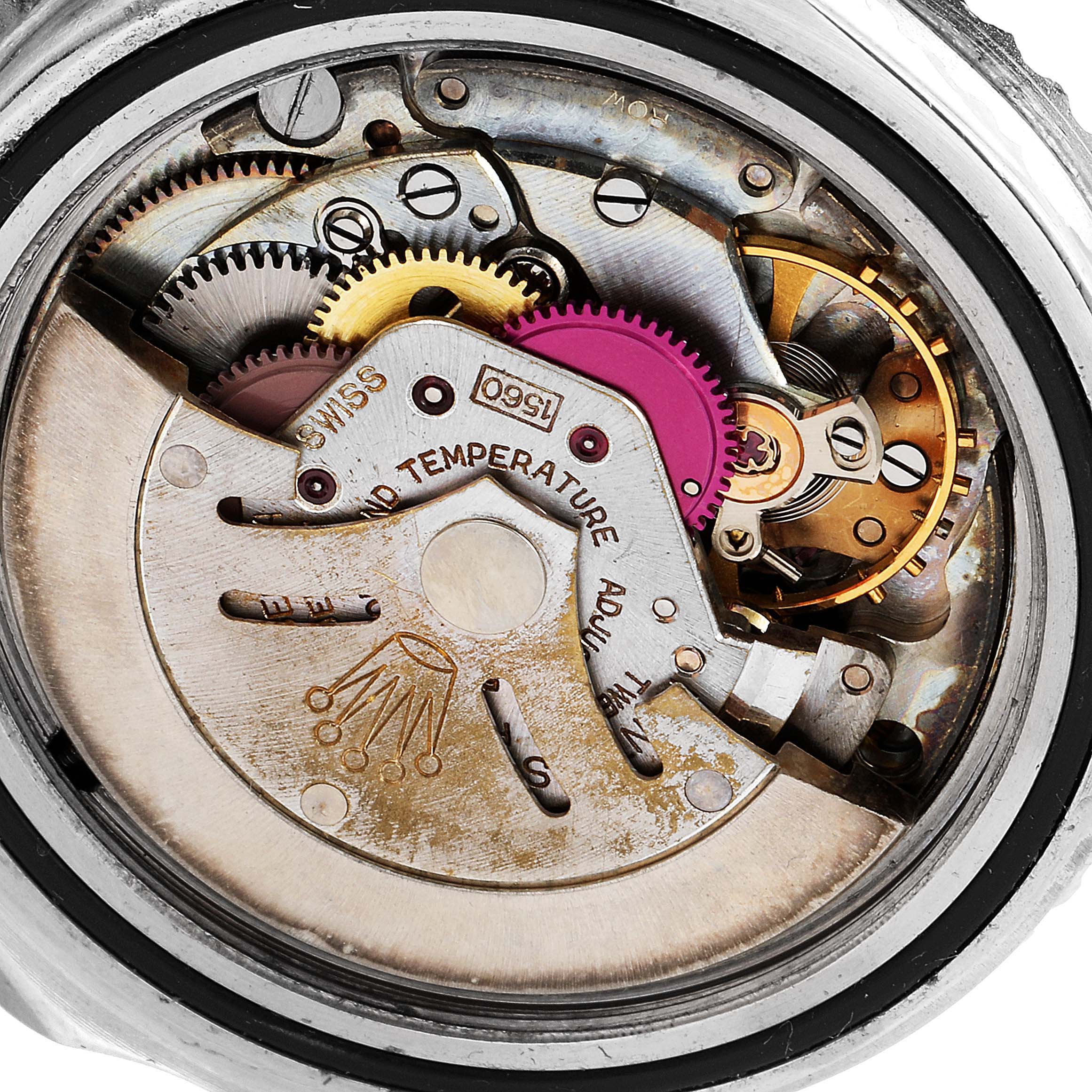 The image shows the internal mechanical movement of a Rolex GMT-Master 1675 Men's Stainless Steel Black Dial 1675 Men's Stainless Steel Black Dial watch, viewed from the back with visible gears and components.