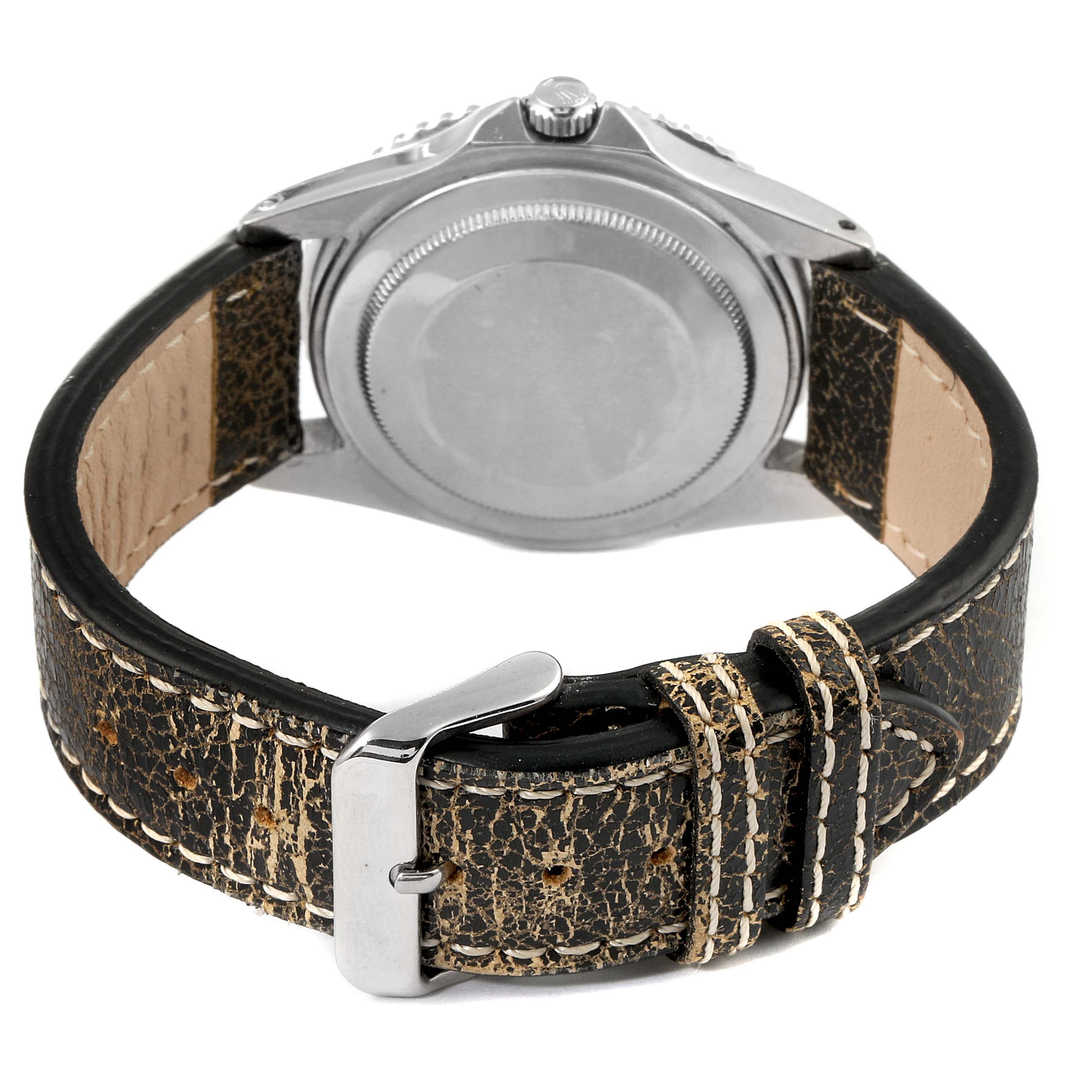 This image shows the back view of a Rolex GMT-Master 1675 Men's Stainless Steel Black Dial 1675 Men's Stainless Steel Black Dial watch, focusing on its case back and leather strap with a metal buckle.