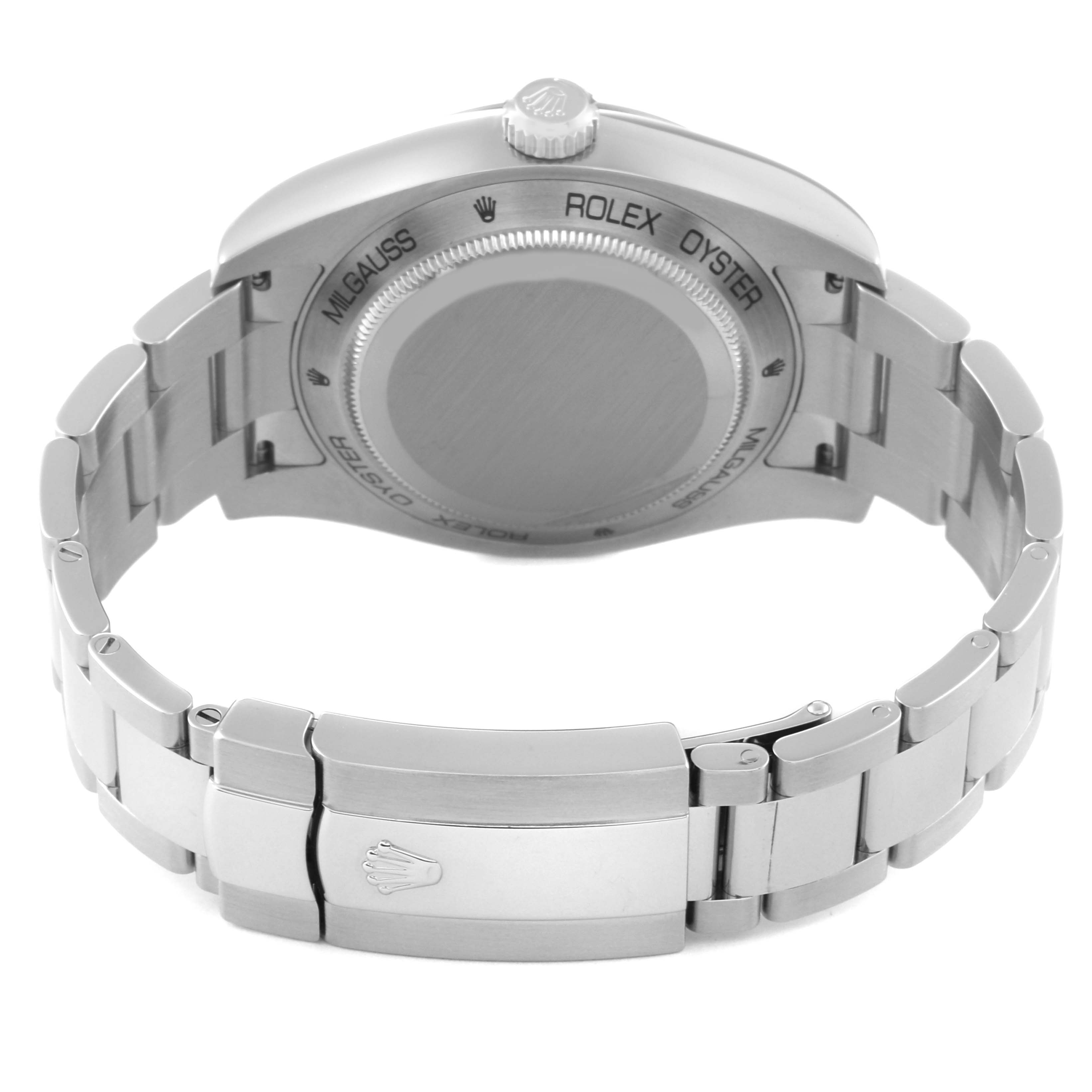 The image shows the back view of a Rolex Milgauss 116400GV Men's Stainless Steel Black Dial 116400GV Men's Stainless Steel Black Dial watch, focusing on the case back and metal bracelet.