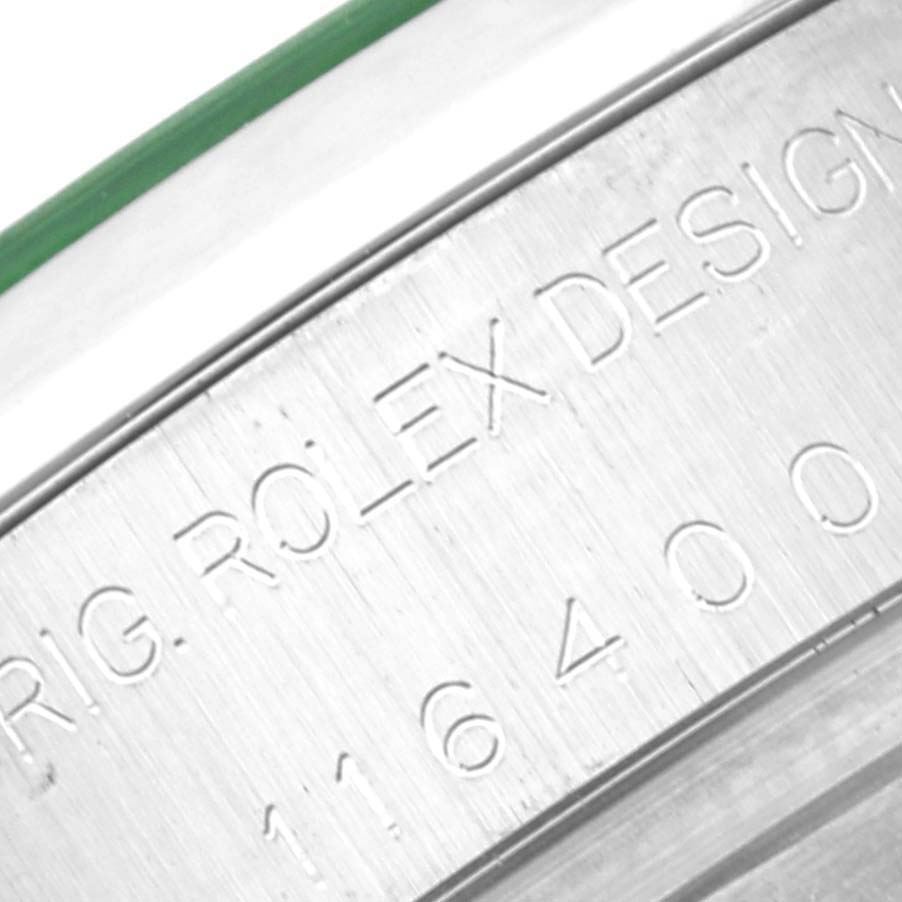 The image shows a close-up of the model and brand engraving on the side of a Rolex Milgauss 116400GV Men's Stainless Steel Black Dial 116400GV Men's Stainless Steel Black Dial watch, displaying "ROLEX DESIGN 116400."