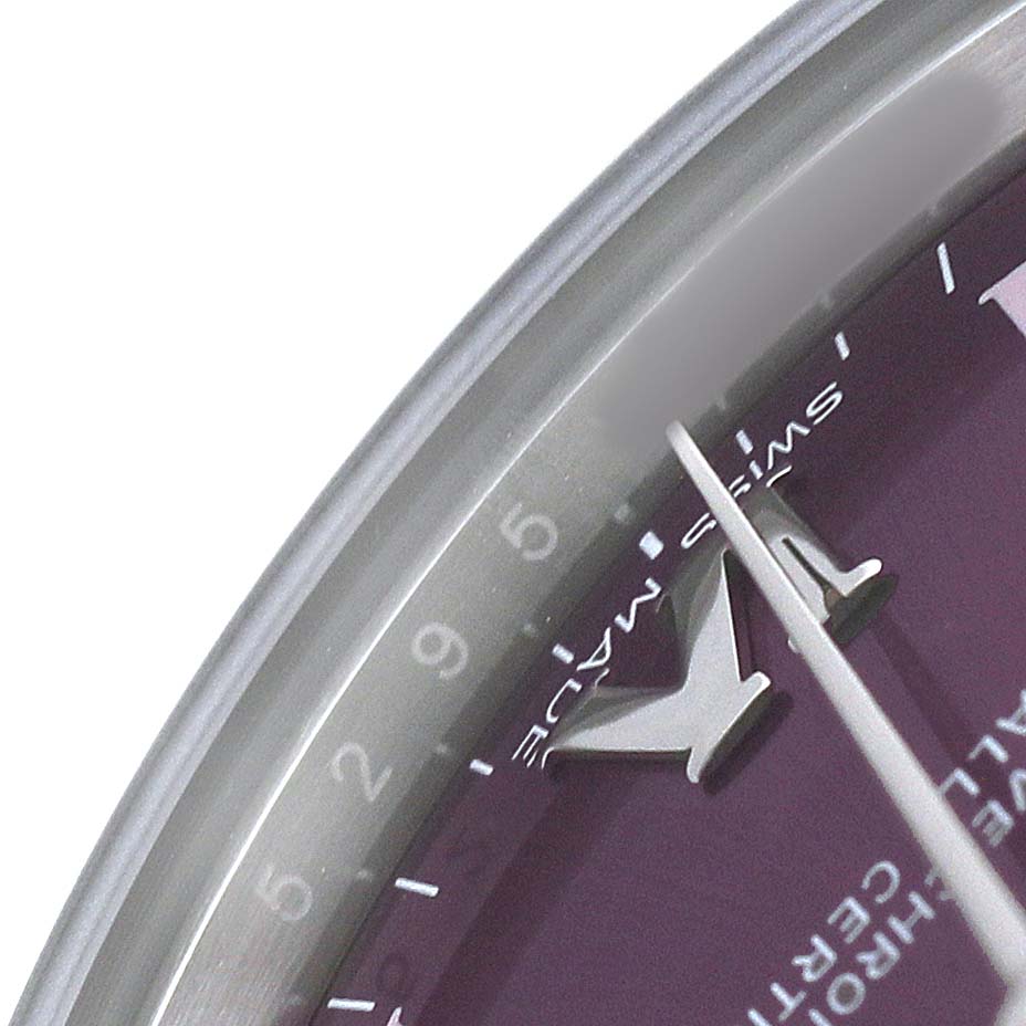The image shows a close-up of the dial and hands of the Rolex Oyster Perpetual 177200 Women's Stainless Steel Purple Dial watch from an oblique angle.