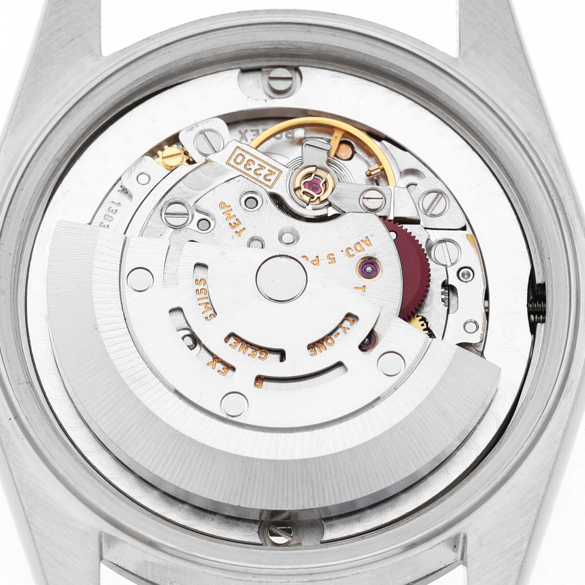 The image shows the movement mechanism of a Rolex Oyster Perpetual 77080 Women's Stainless Steel Pink Dial watch viewed from the back, highlighting gears and the rotor.