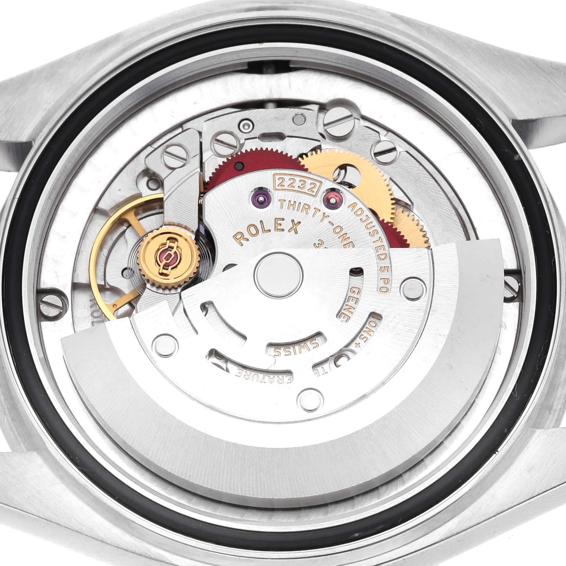 The image shows the movement and inner mechanics of a Rolex Oyster Perpetual 277200 Women's Stainless Steel Blue Dial watch from a top-down angle.