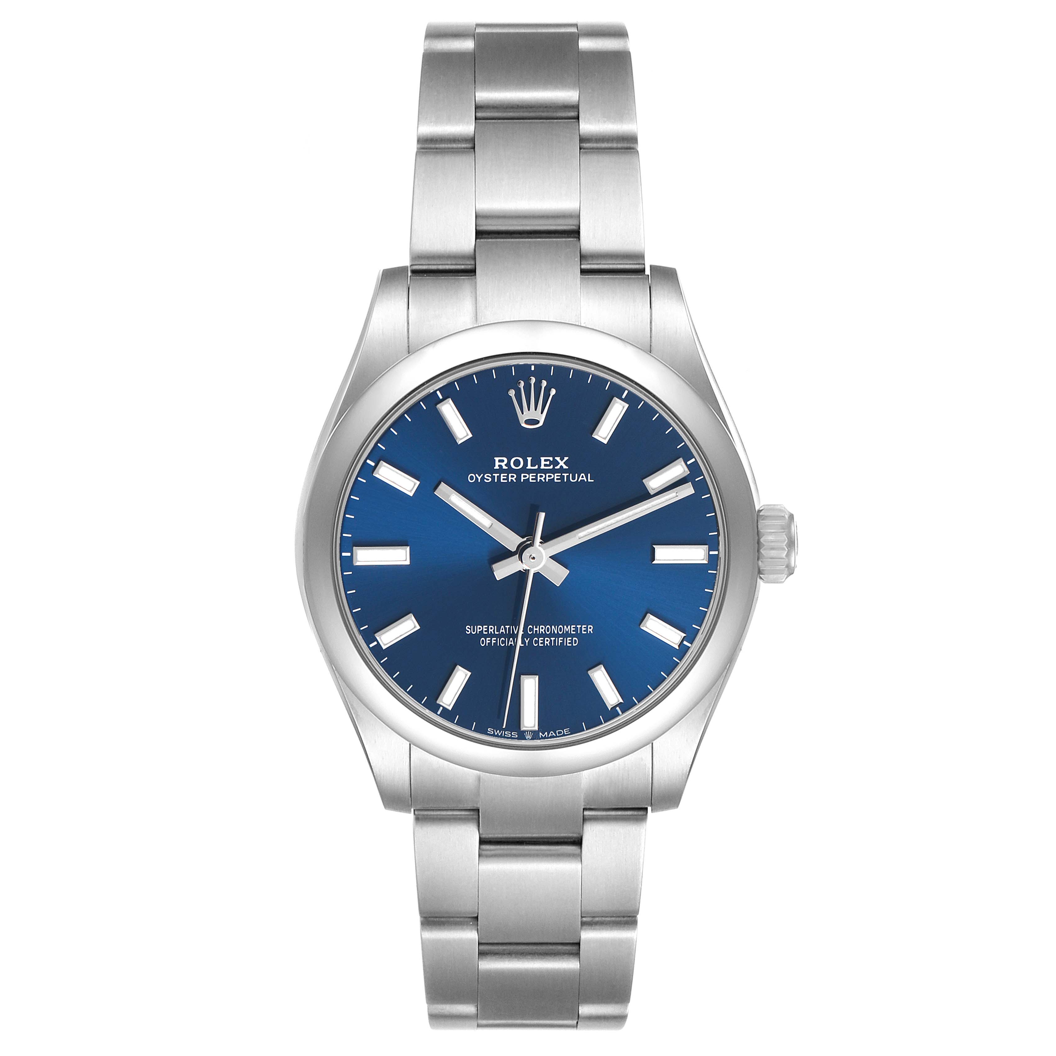 The Rolex Oyster Perpetual 277200 Women's Stainless Steel Blue Dial watch is shown from a front angle, displaying the blue dial, hands, hour markers, and the bracelet.