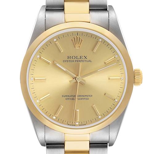 The image shows a front view of a Rolex Oyster Perpetual 14203 Men's Steel and Gold (two tone) Champagne Dial watch, highlighting the dial, bezel, and part of the bracelet.