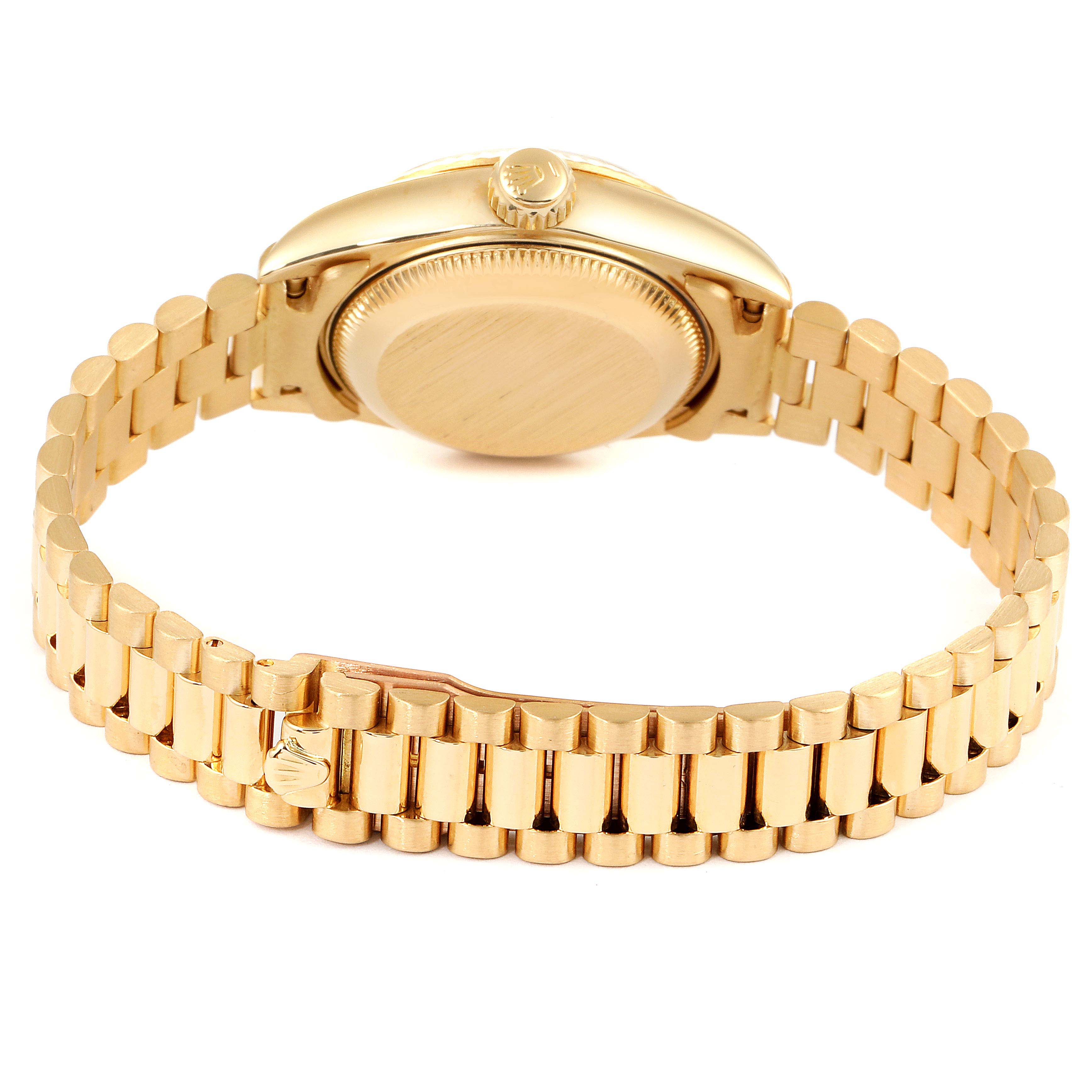 This image shows the gold bracelet and the back case of a Rolex President 69178 Women's Yellow Gold Champagne Dial 69178 Women's Yellow Gold Champagne Dial model watch from a rear angle.