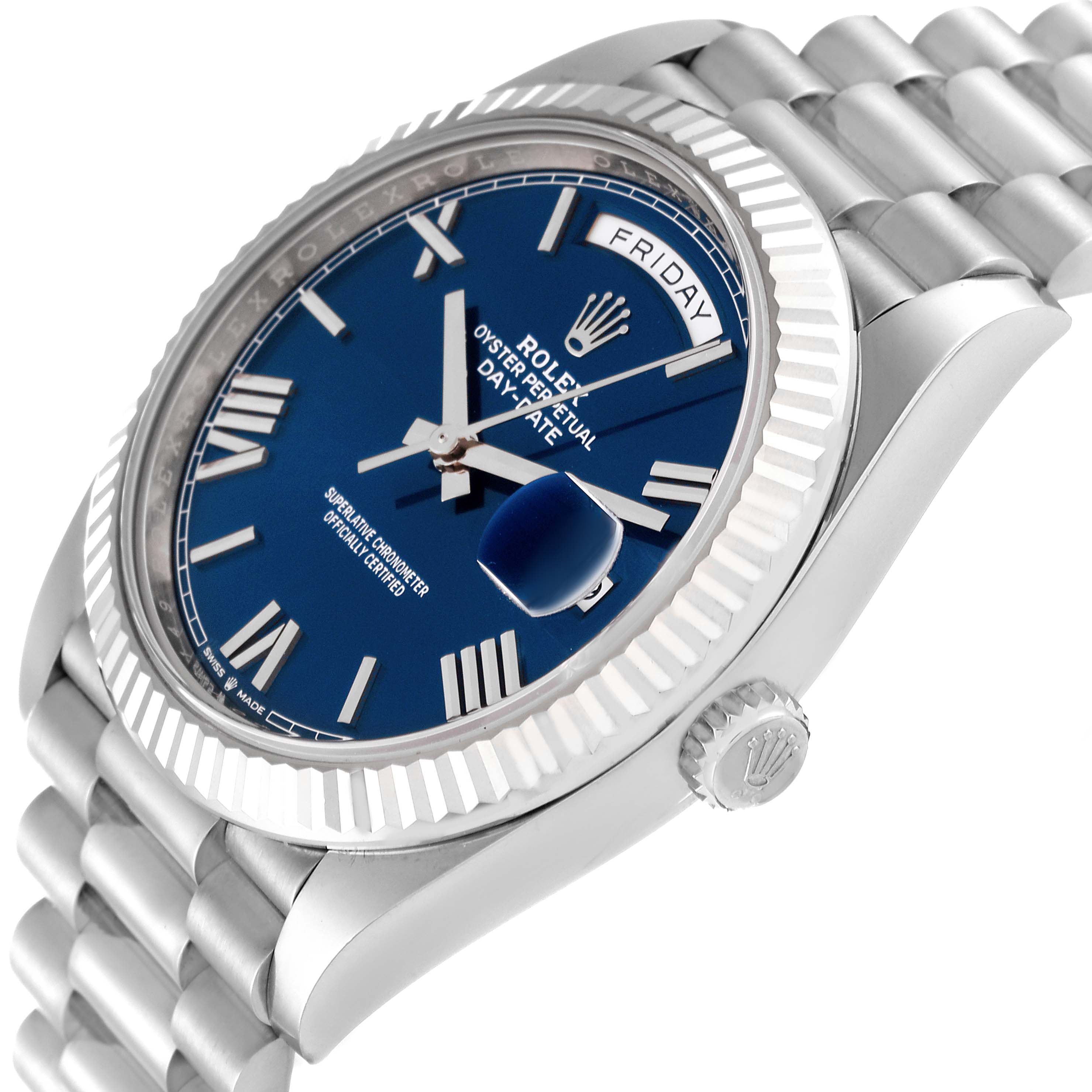 The image shows a side angle of a Rolex President 228239 Men's White Gold Blue Dial 228239 Men's White Gold Blue Dial model watch, highlighting the crown, bezel, and part of the bracelet.