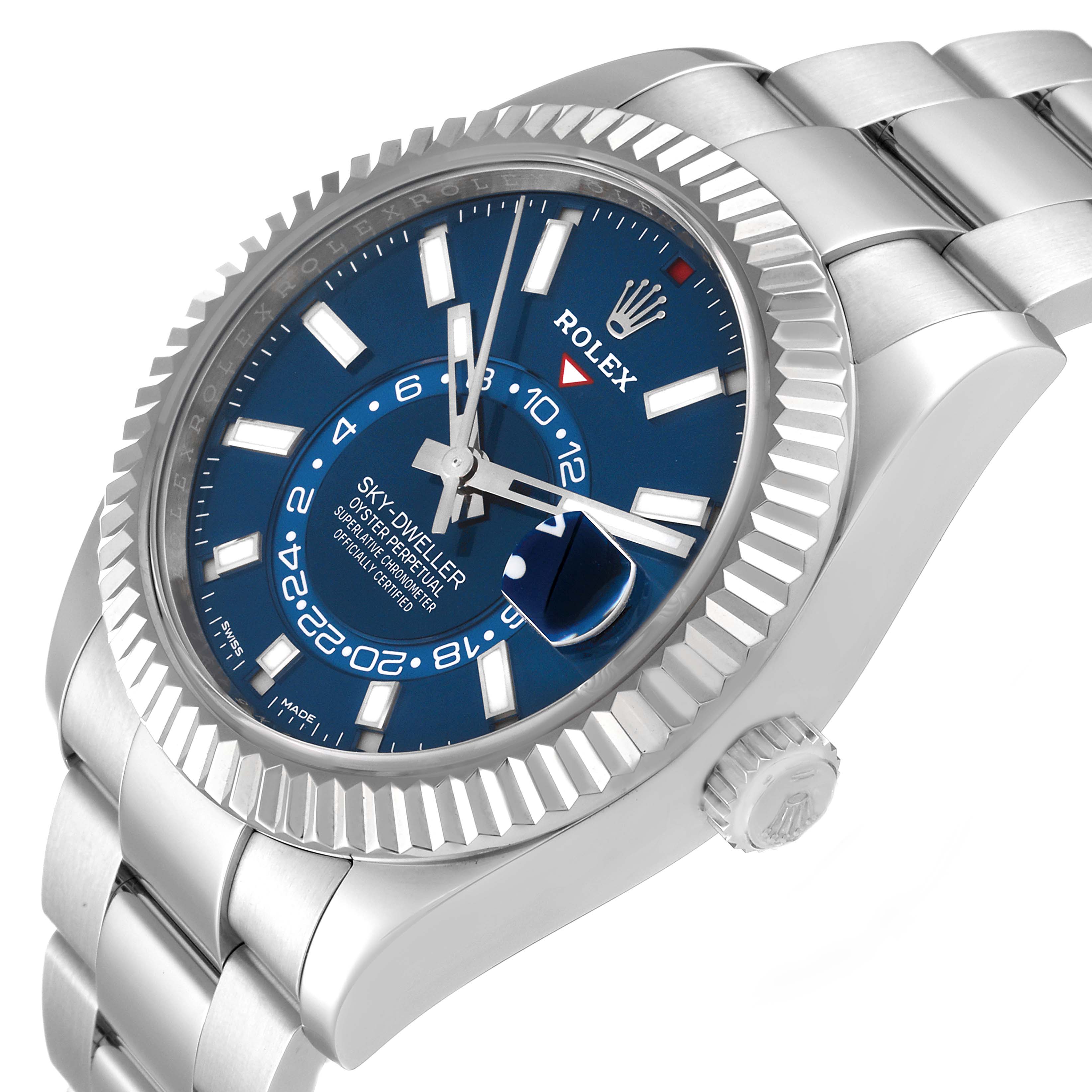 This image shows a Rolex Sky-Dweller 326934 Men's Stainless Steel Blue Dial 326934 Men's Stainless Steel Blue Dial watch from a three-quarter angle, highlighting the blue dial, fluted bezel, and bracelet.