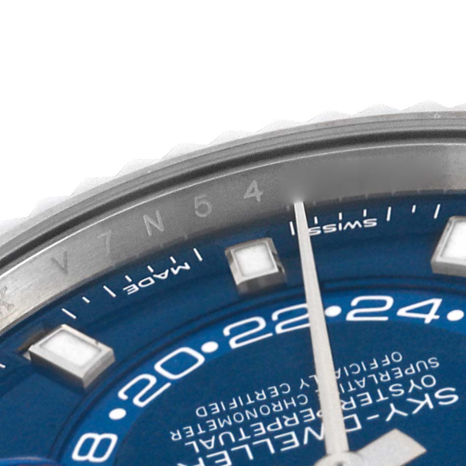 This close-up image shows the dial and bezel of a Rolex Sky-Dweller 326934 Men's Stainless Steel Blue Dial 326934 Men's Stainless Steel Blue Dial watch.