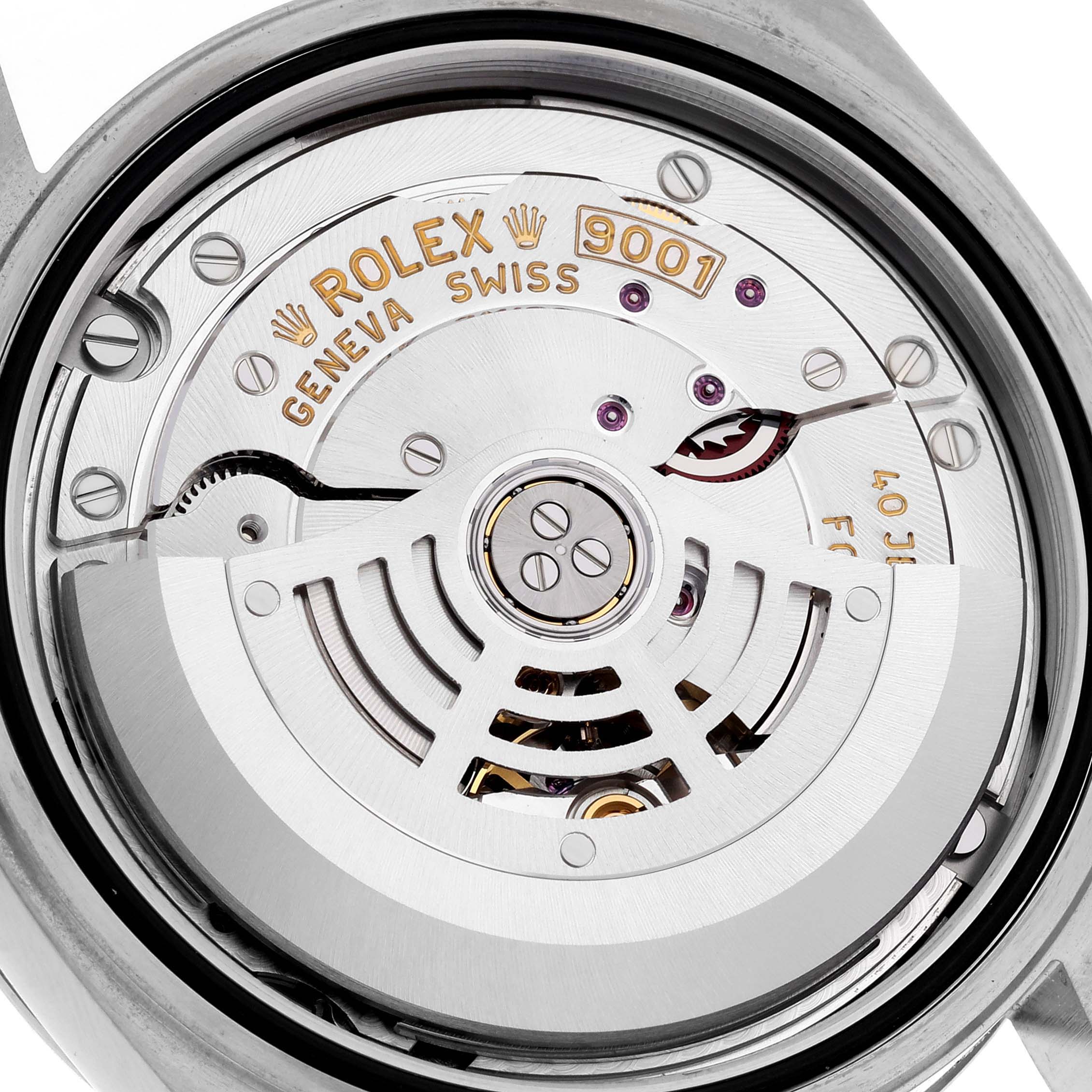 The image shows the movement of the Rolex Sky-Dweller 326934 Men's Stainless Steel Blue Dial 326934 Men's Stainless Steel Blue Dial watch from a rear angle, highlighting the rotor and intricate mechanisms.