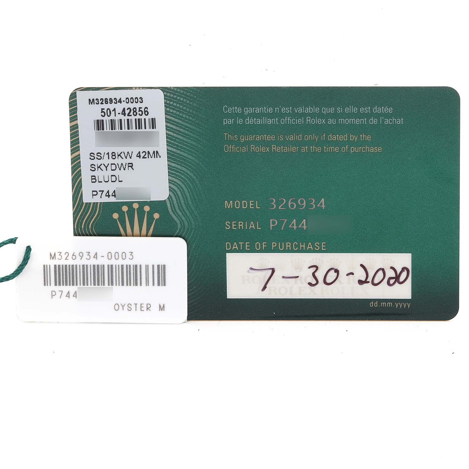 The image shows a Rolex Sky-Dweller 326934 Men's Stainless Steel Blue Dial 326934 Men's Stainless Steel Blue Dial warranty card and tag with model and purchase details.