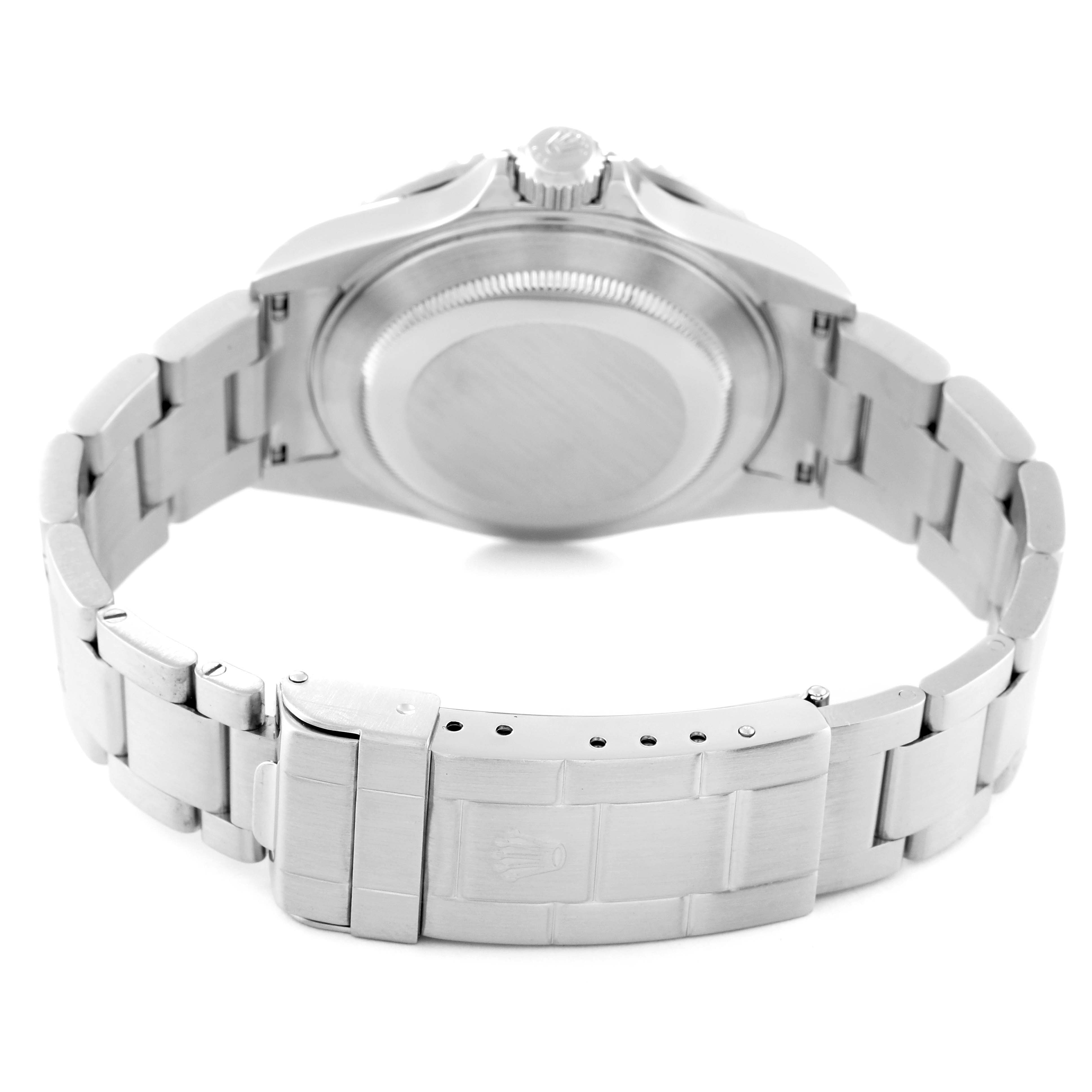 The image shows the back view of a Rolex Submariner 16610 Men
s Stainless Steel Black Dial 16610 Men
s Stainless Steel Black Dial, highlighting the stainless steel bracelet and clasp.