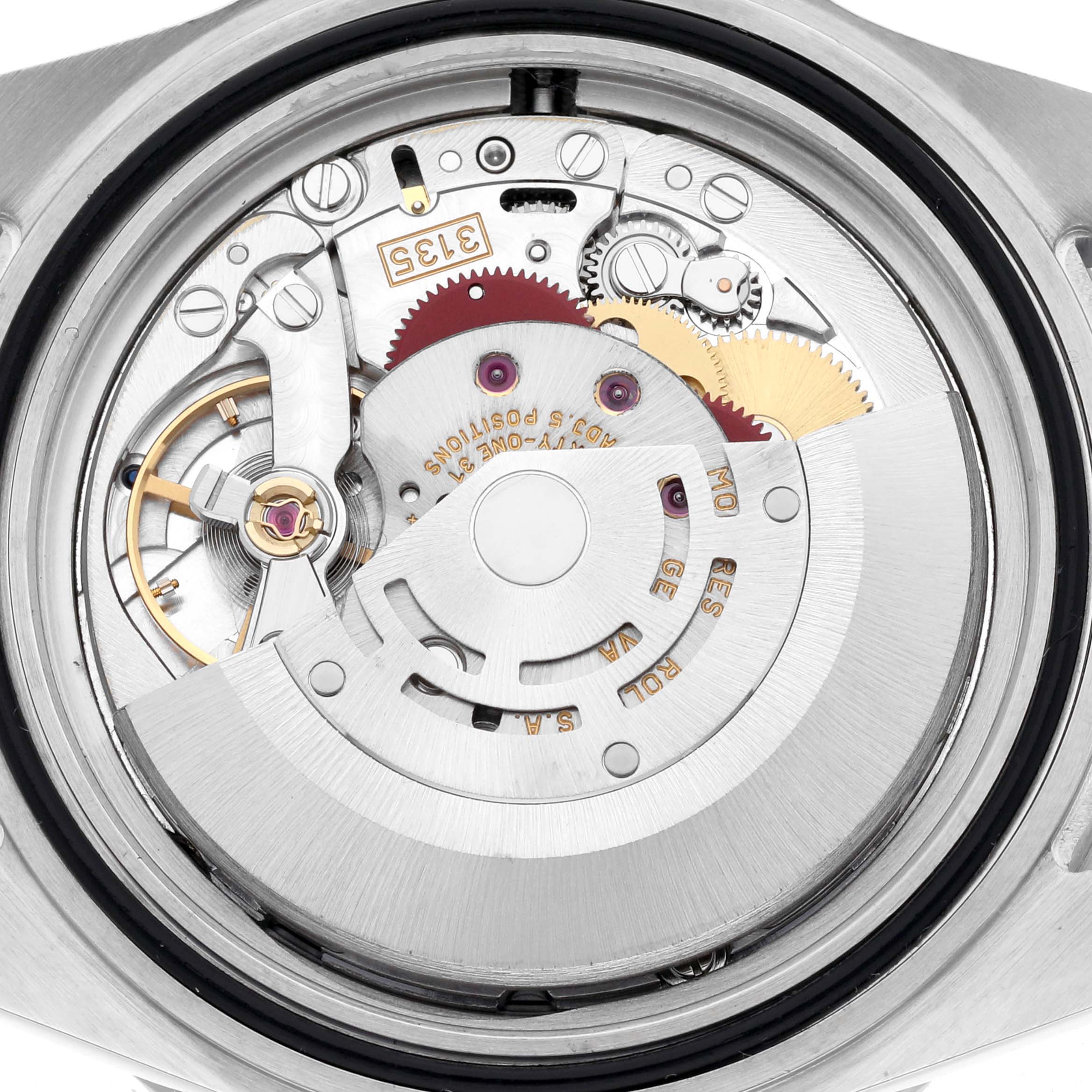The image shows the movement mechanism of a Rolex Submariner 16610 Men's Stainless Steel Black Dial 16610 Men's Stainless Steel Black Dial watch from a top-down angle.
