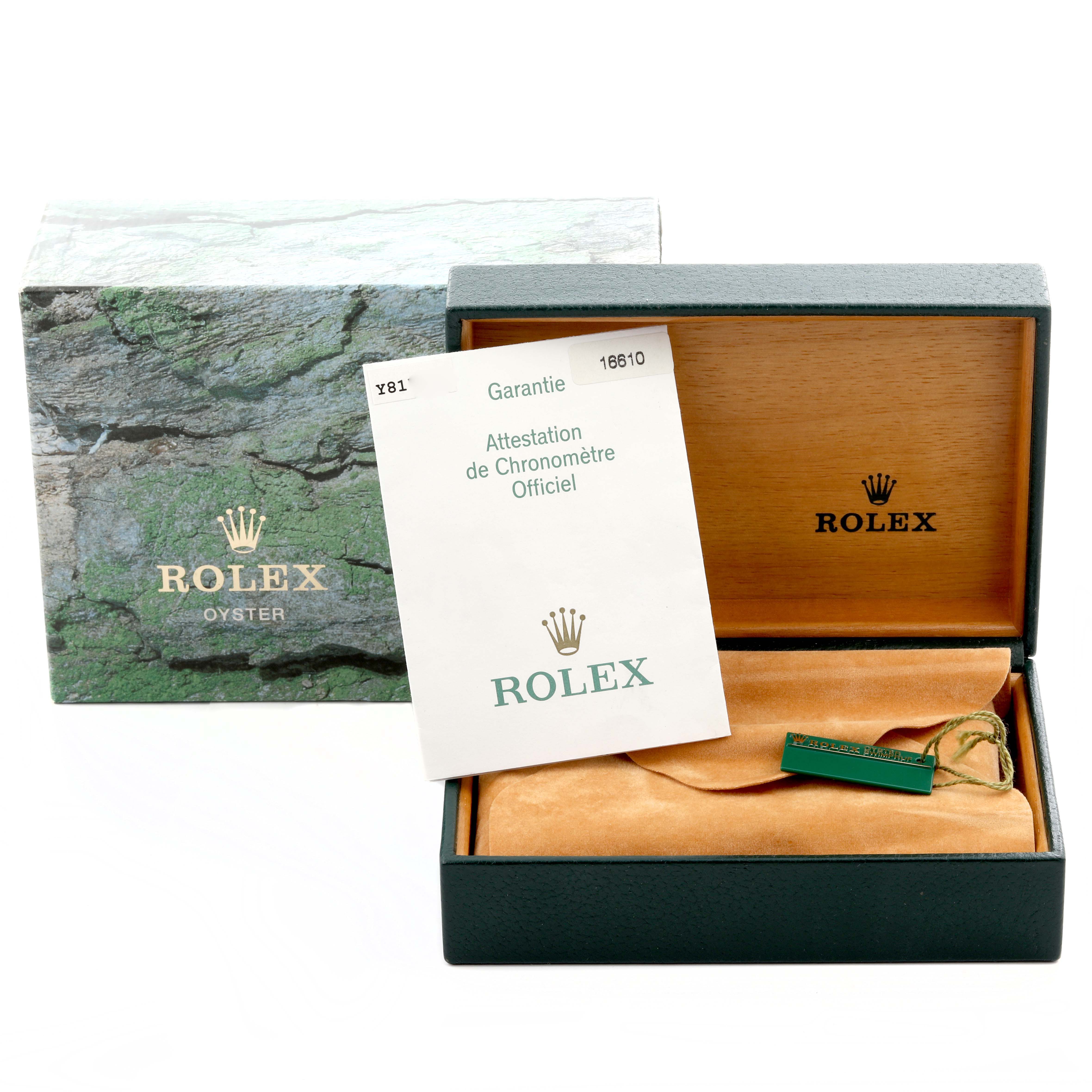 The image shows a Rolex Submariner 16610 Men's Stainless Steel Black Dial 16610 Men's Stainless Steel Black Dial watch box, warranty card, and tag from a front angle.