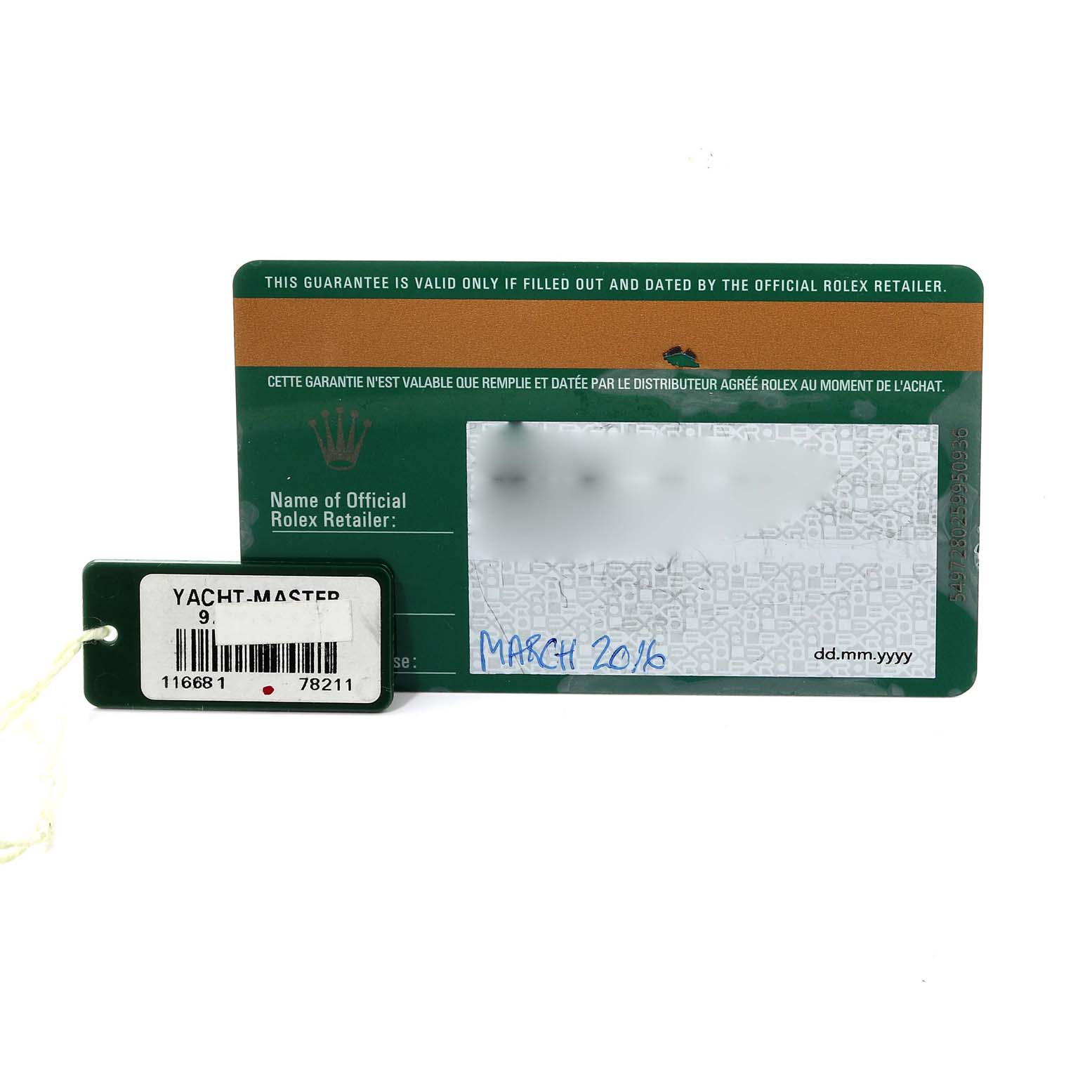 The image shows an official Rolex warranty card and an attached Yacht-Master model tag.