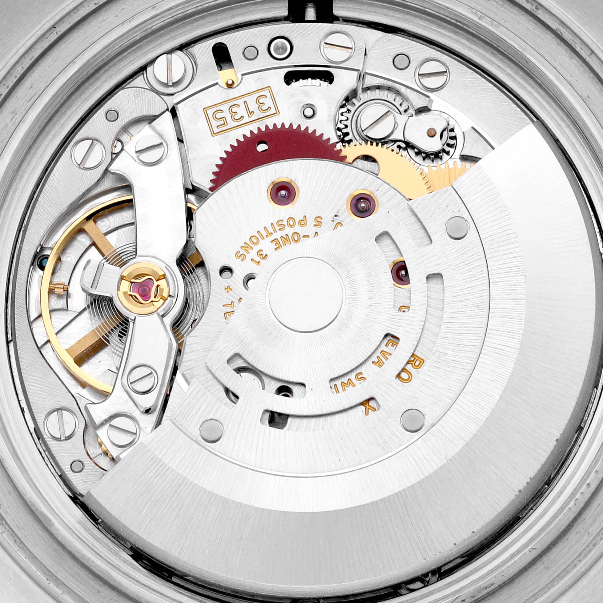 This image shows the intricate inner movement and gears of the Rolex Yacht-Master 16623 Men's Steel and Gold (two tone) Mother of Pearl Dial 16623 Men's Steel and Gold (two tone) Mother of Pearl Dial watch, viewed from the back.