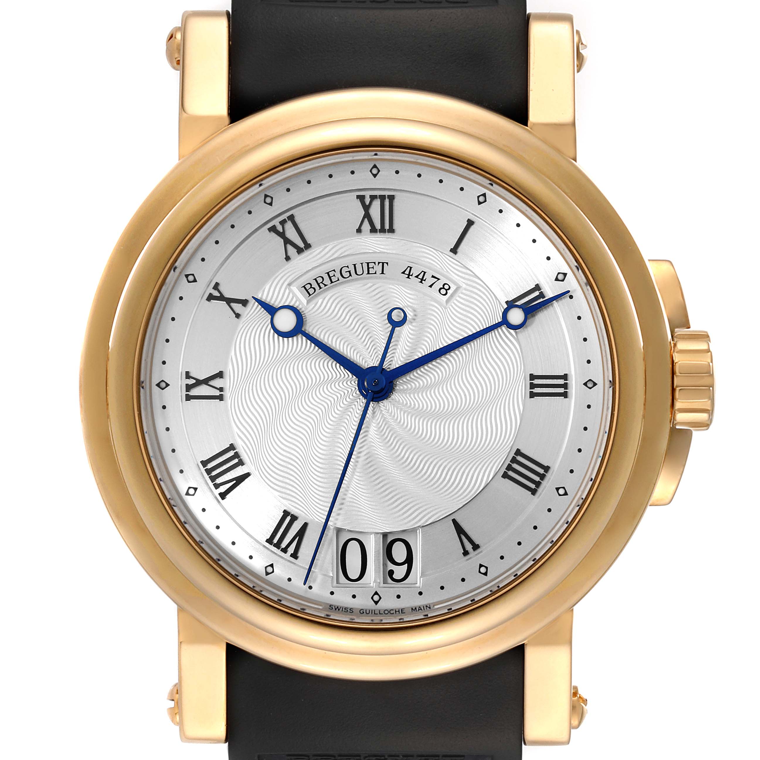 The image shows a front view of a Breguet Marine 5817BA/12/9V8 Men's Yellow Gold Silver Dial 5817BA/12/9V8 Men's Yellow Gold Silver Dial model watch, featuring a gold case, silver dial, blue hands, and Roman numerals.