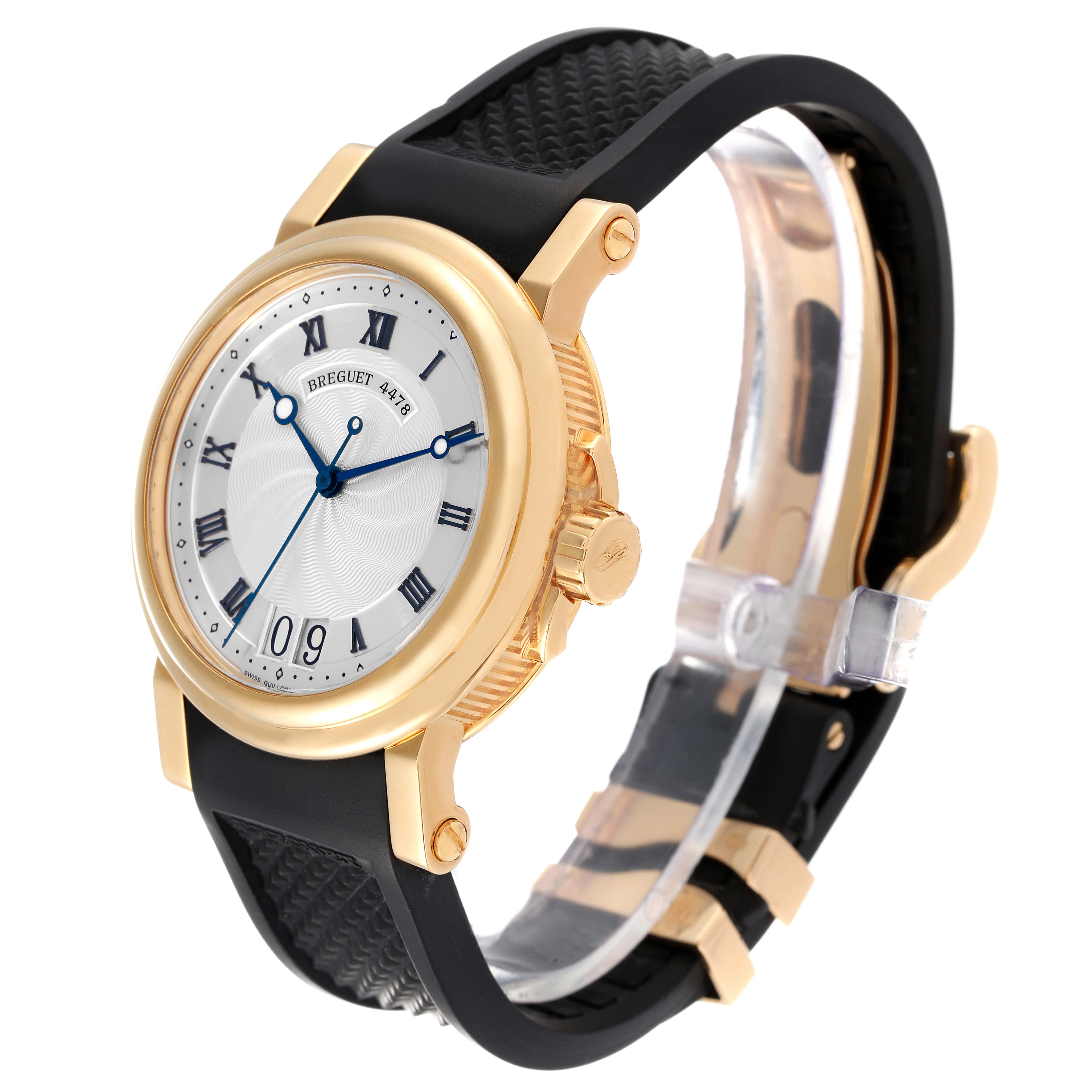 This Breguet Marine 5817BA/12/9V8 Men's Yellow Gold Silver Dial 5817BA/12/9V8 Men's Yellow Gold Silver Dial model watch is shown at an angle, highlighting the dial, bezel, crown, and black strap with gold accents.