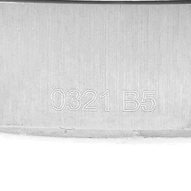 This close-up image shows part of the casing with engraving on a Breitling Superocean A17366 Men's Stainless Steel White Dial A17366 Men's Stainless Steel White Dial watch.