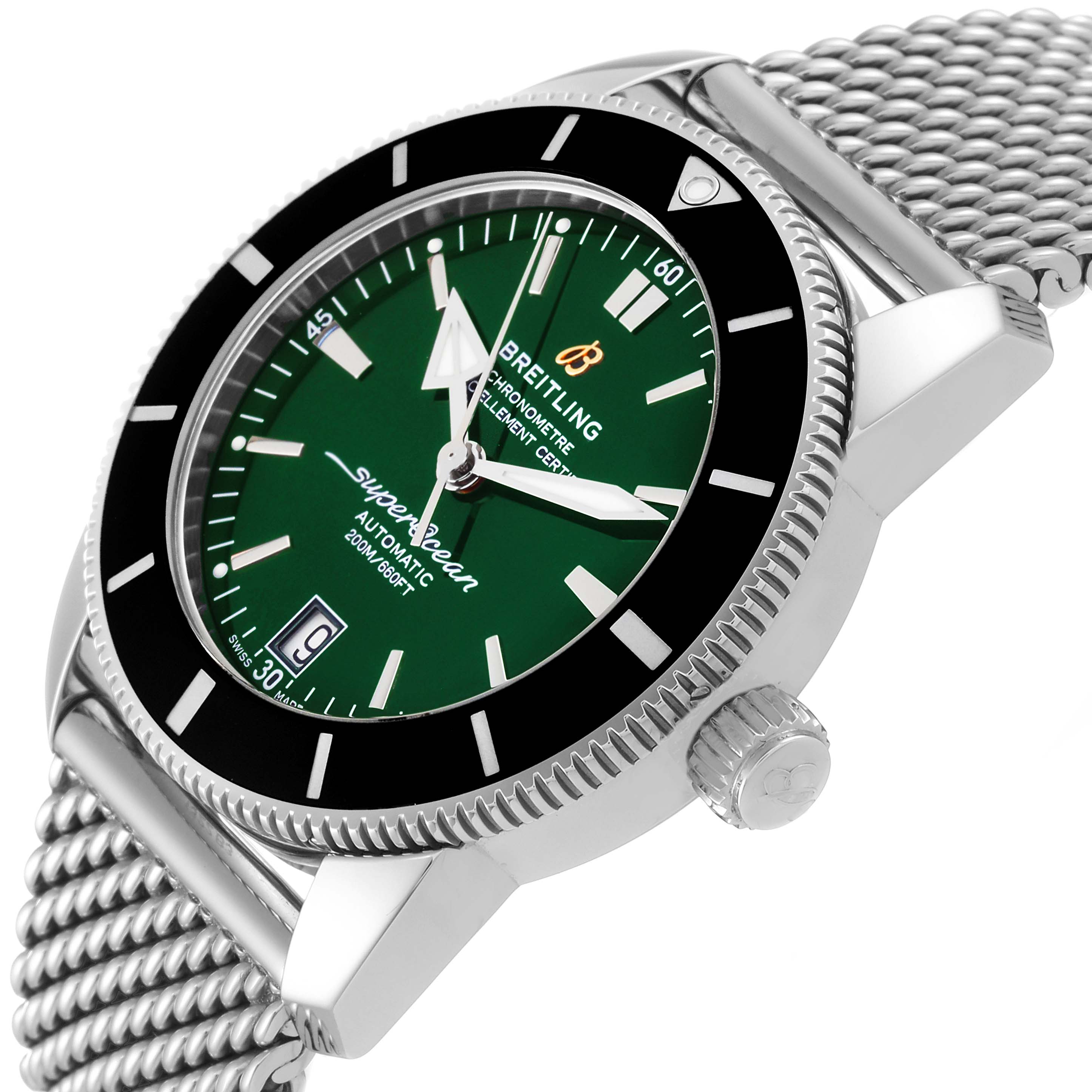 The image shows a close side angle of a Breitling Superocean AB2010 Men's Stainless Steel Green Dial AB2010 Men's Stainless Steel Green Dial watch, highlighting the green dial, bezel, crown, and metal mesh strap.