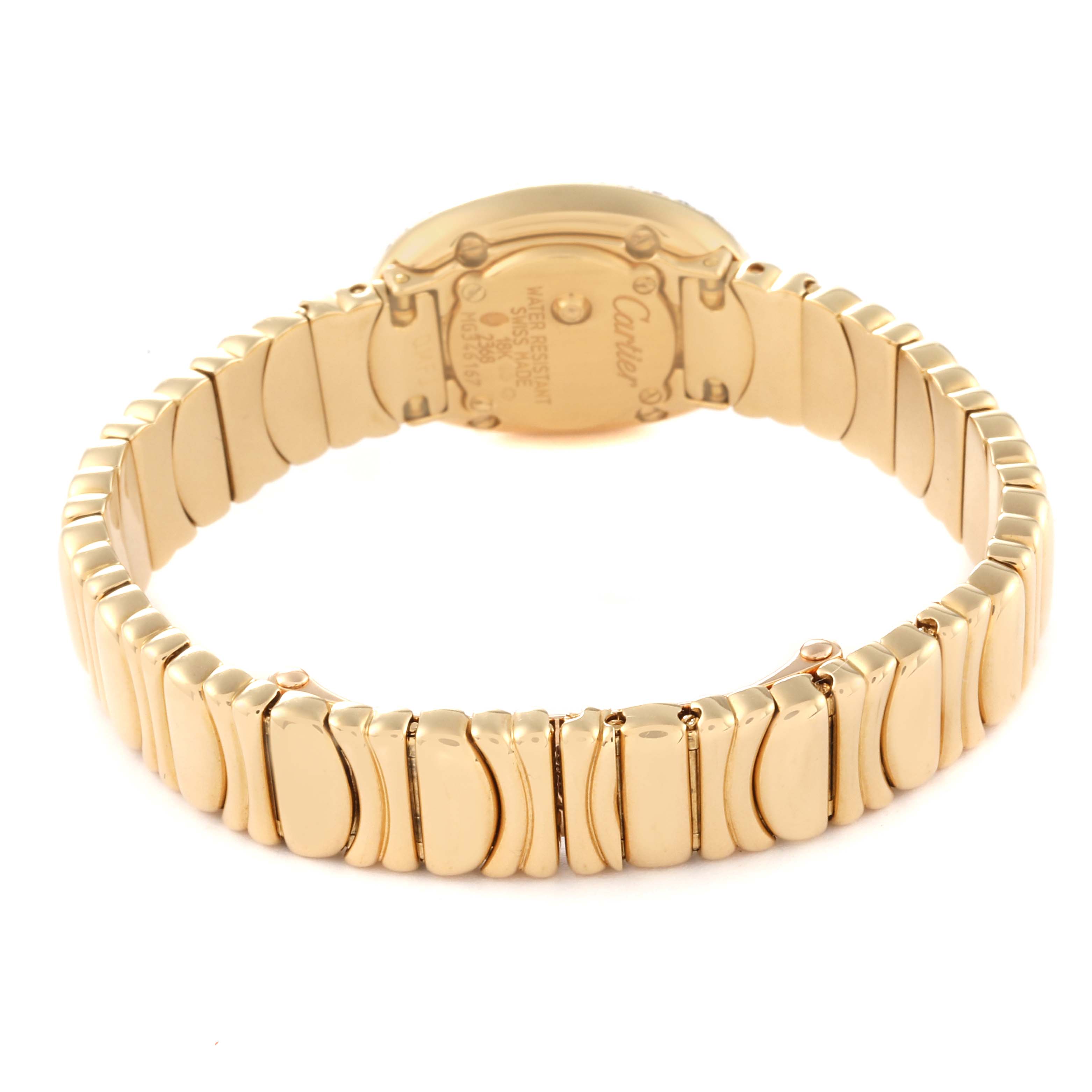 The image shows the back and bracelet of the Baignoire model by Cartier, highlighting its gold-tone links.